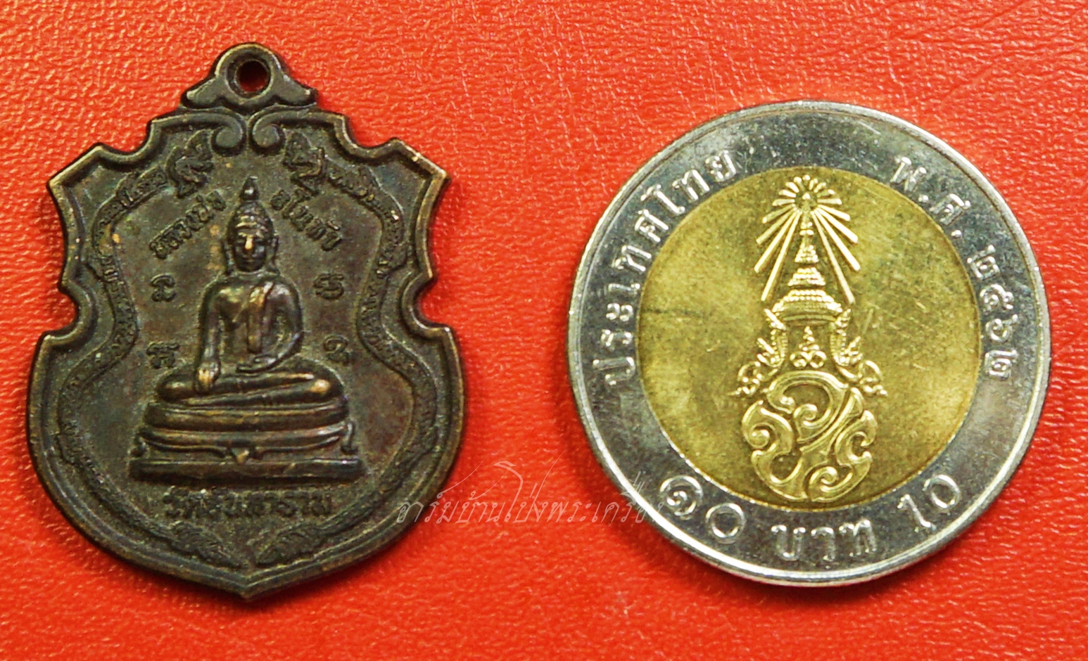 หลวงพ่ออโนทัย วัดจันทาราม เหรียญพญานาคคู่ เนื้อทองแดงรมดำ(องค์ที่1)