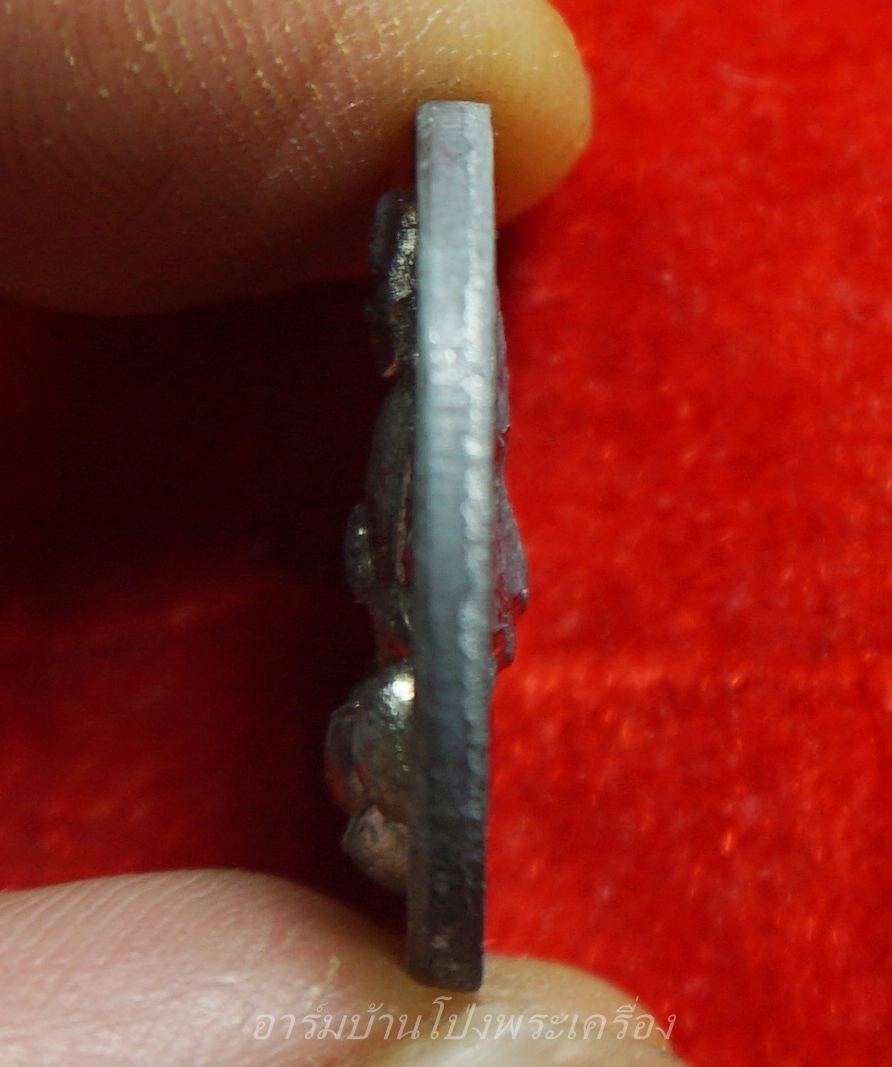 หลวงพ่อหวล วัดชาวเหนือ รุ่นทำน้ำมนต์ เนื้อตะกั่ว หลังหน้าเสือ(องค์ที่1)