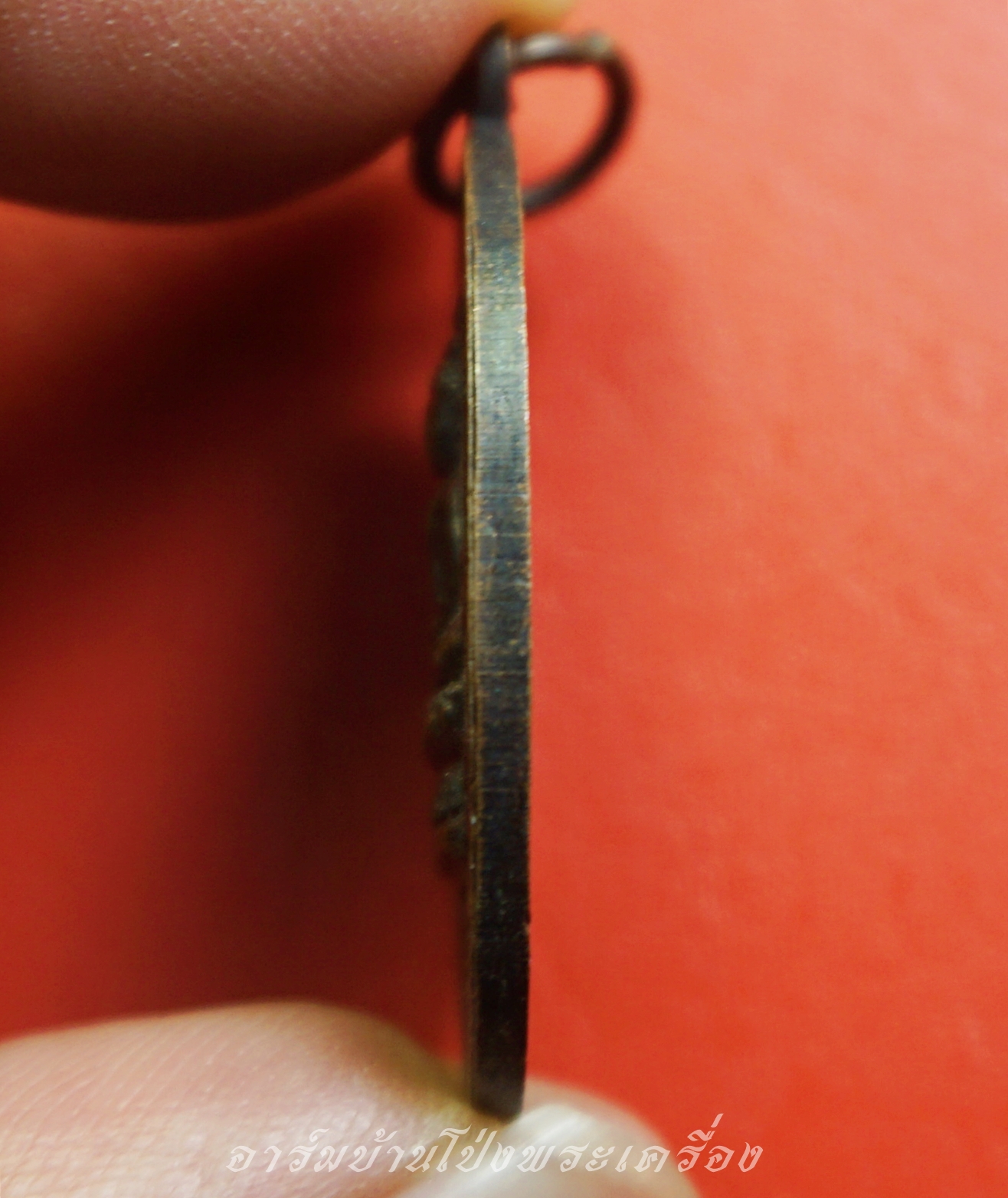 หลวงพ่อแดง วัดธรรมวิโรจน์ จ.ราชบุรี เนื้อทองแดงรมดำ(องค์ที่1)