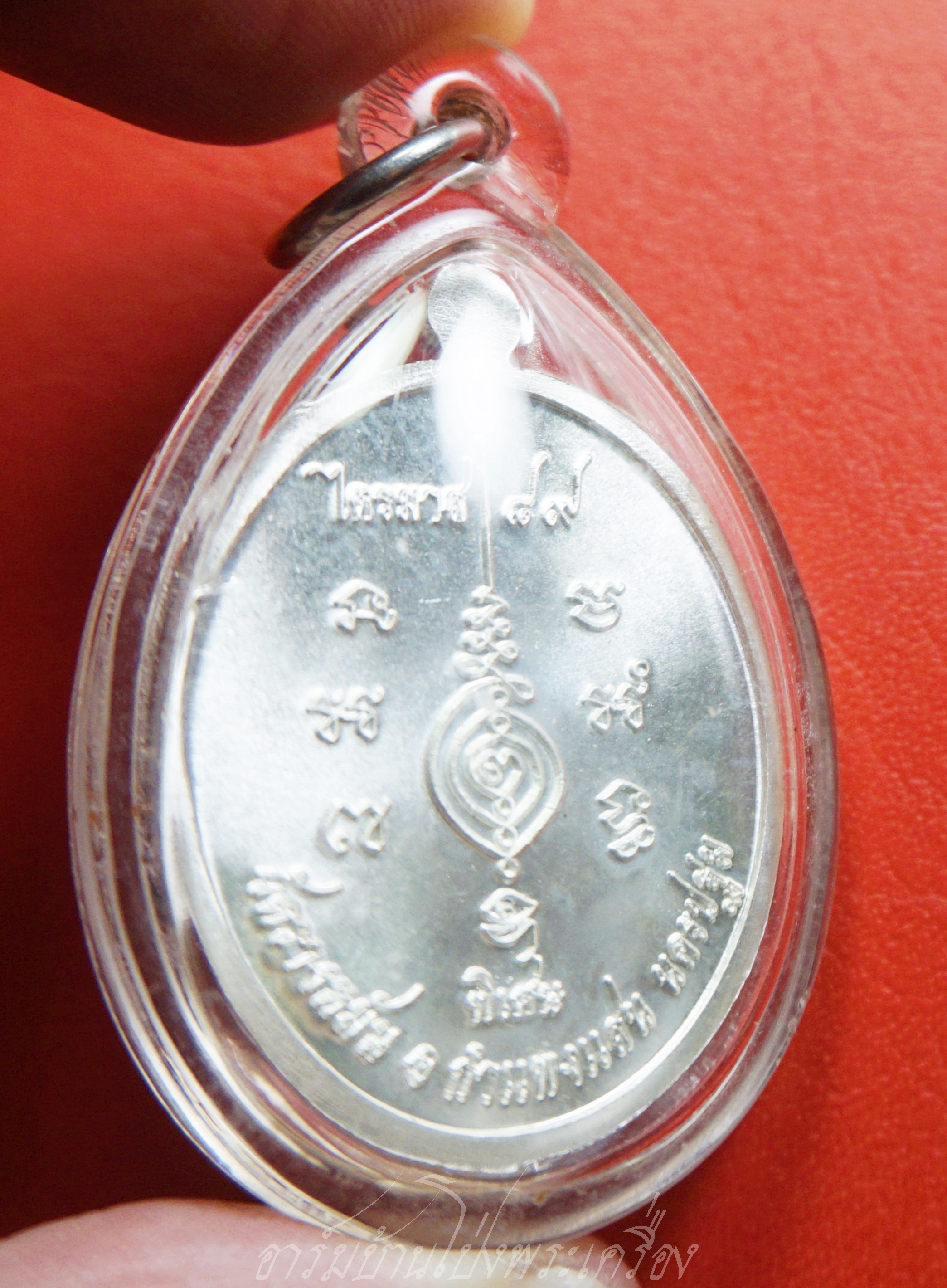 หลวงปู่แผ้ว วัดรางหมัน กนกข้าง เนื้อเงิน ตอกเลข๓๕๘๗(องค์ที่1)