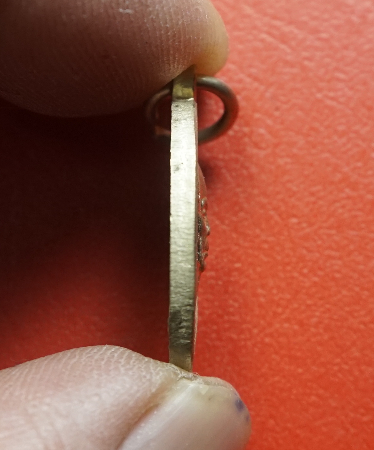 หลวงปู่สิน วัดละหารใหญ่ จ.ระยอง ปี ๒๕๕๕ เม็ดแตงใหญ่ เนื้ออัลปาก้า(องค์ที่1)