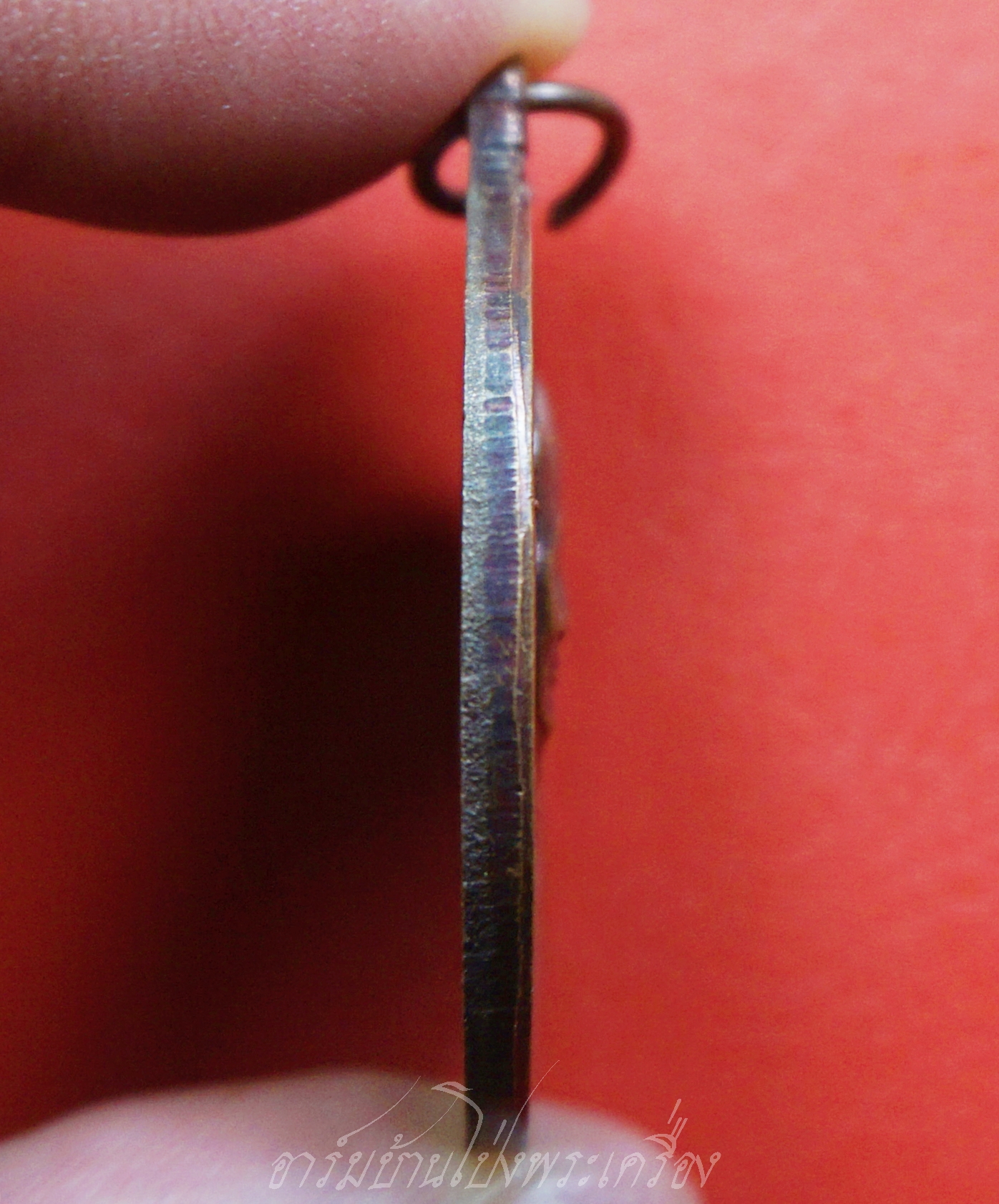 หลวงปู่ม่น วัดเนินตามาก รุ่นไตรมาส ปี๒๕๓๗ เนื้อทองแดงรมดำ(องค์ที่1)