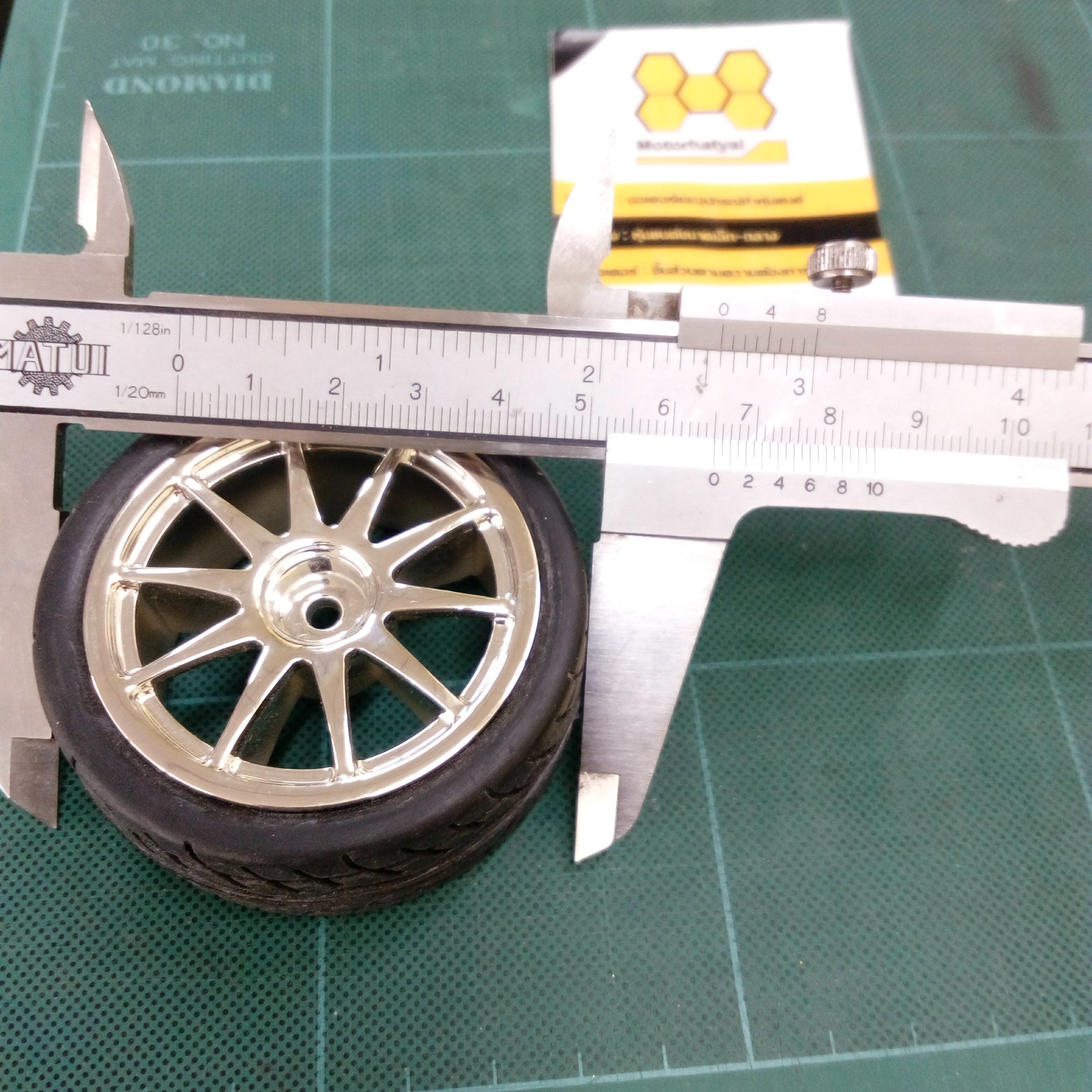 ล้อยาง หน้ากว้าง 27mm เส้นผ่านเส้นศูนย์กลาง 65mmเบ้ารับหกเหลี่ยม รูใน4mm