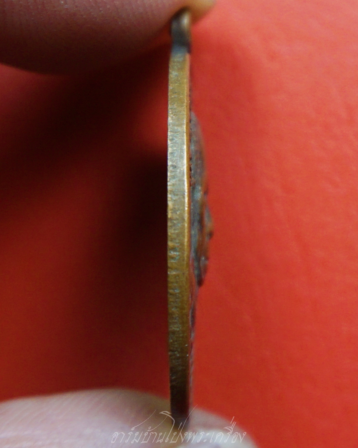 พระครูใบฎีกาพยากรณ์(ท้วม) วัดแสนสุข จ.ชลบุรี รุ่นปักกรดไม่ถอน เนื้อทองแดงรมดำ(องค์ที่7)