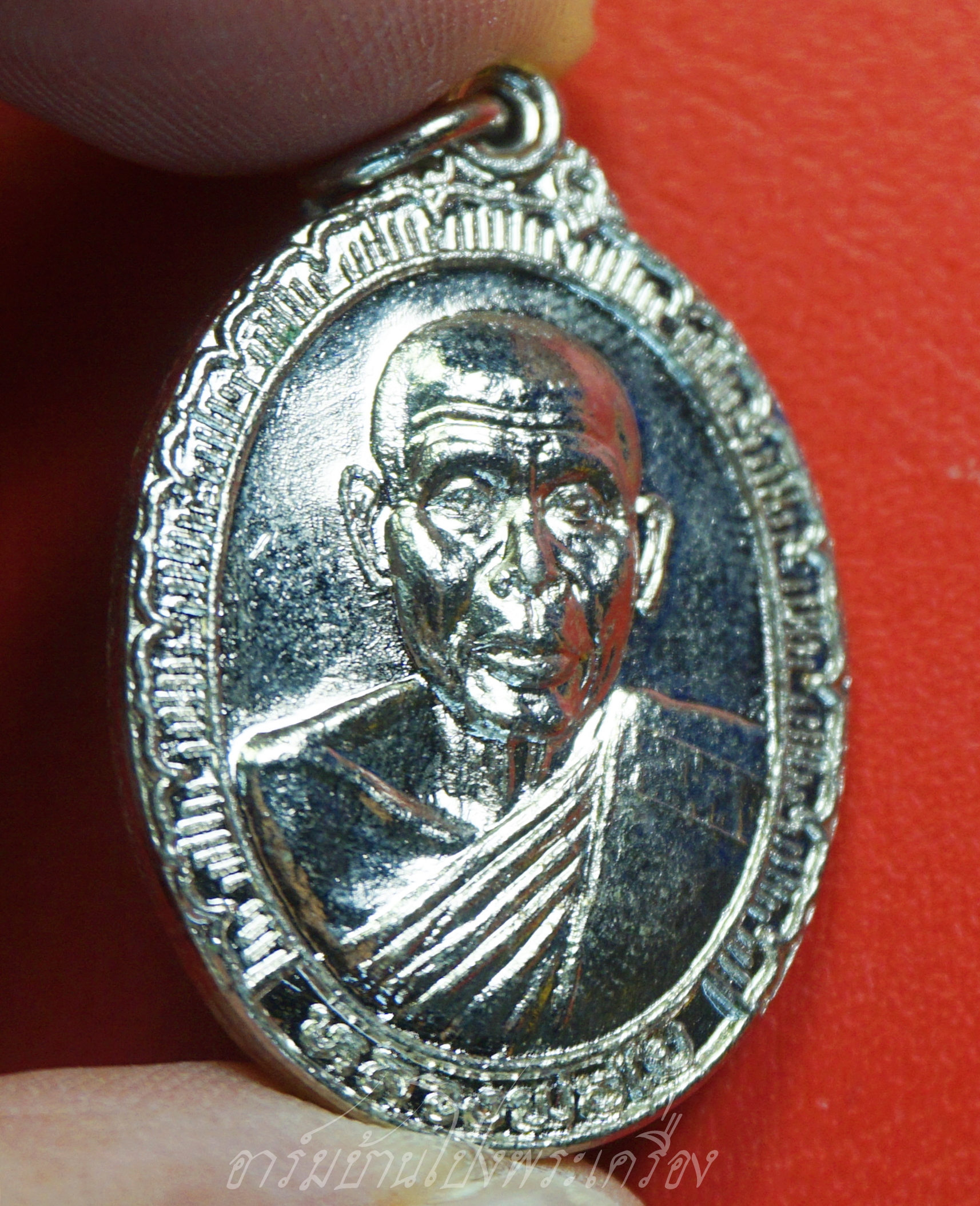 พระอาจารย์ใย วัดหนองอ้อตะวันออก รุ่นสร้างอุโบสถ ปี๒๕๓๘ เนื้อกะไหล่เงิน(องค์ที่2)