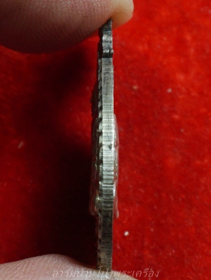 หลวงปู่มหาปิ่น ชลิโต หลัง หลวงพ่อลี วัดอริยวงศาราม หยดน้ำ ปี๒๕๒๑ เนื้อเงิน(องค์ที่1)