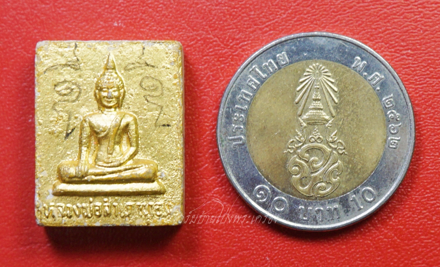 หลวงพ่อสำเภาทอง วัดเนกขัมมาราม ด้านหน้าทาทอง มีจารดินสอ เนื้อผง(องค์ที่1)