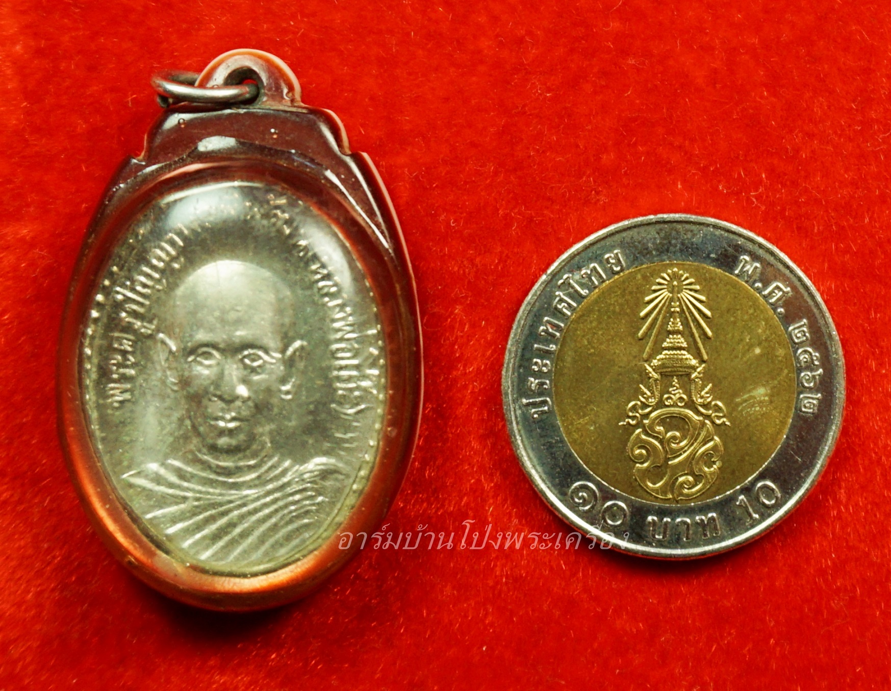 หลวงพ่อโต๊ะ วัดทำนบ รุ่นแรก ปี๒๕๑๓ เนื้อกะไหล่เงิน(องค์ที่3)