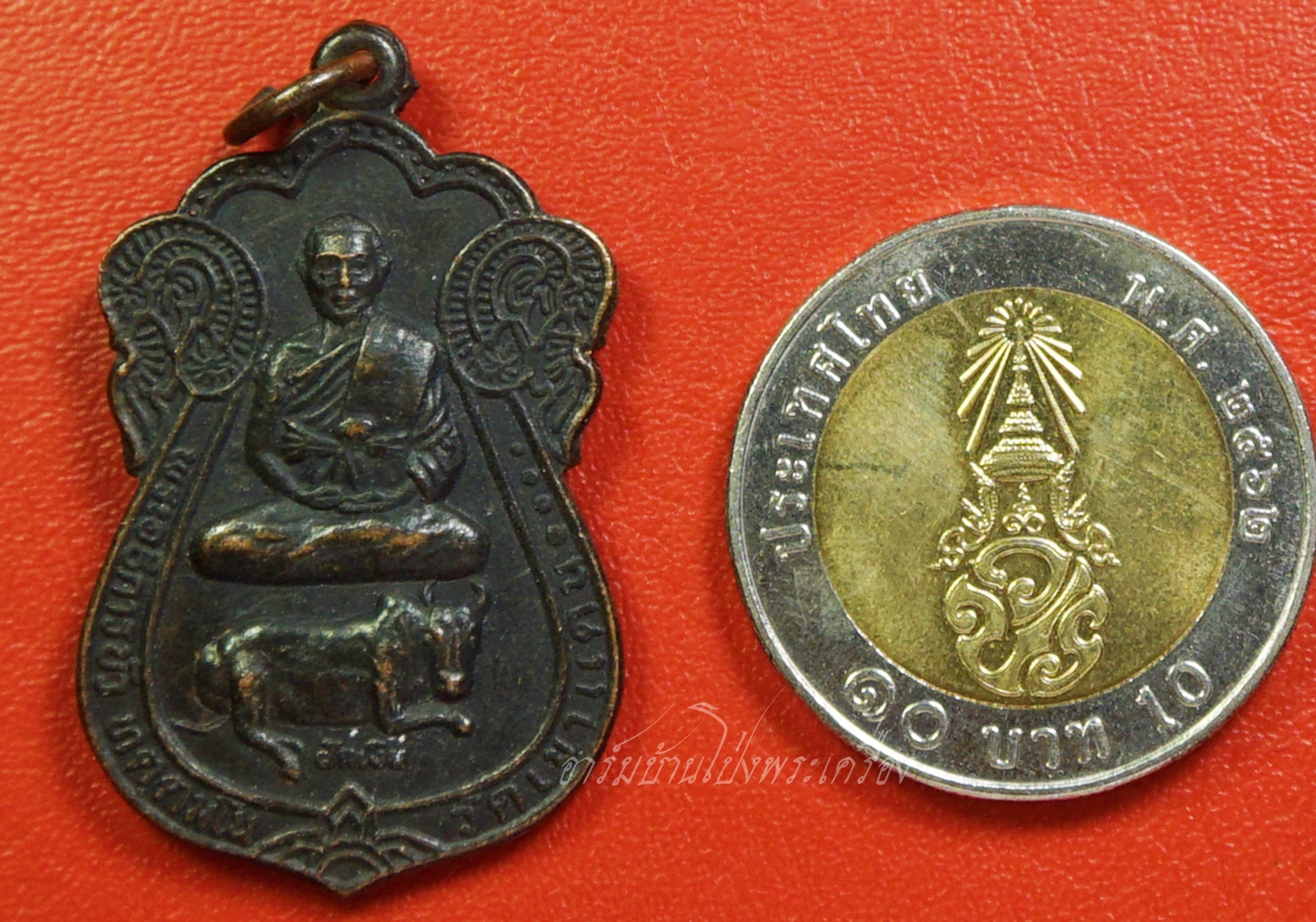 พระอธิการบัว วัดเขาแดน รุ่น๑ เนื้อทองแดง(องค์ที่10)