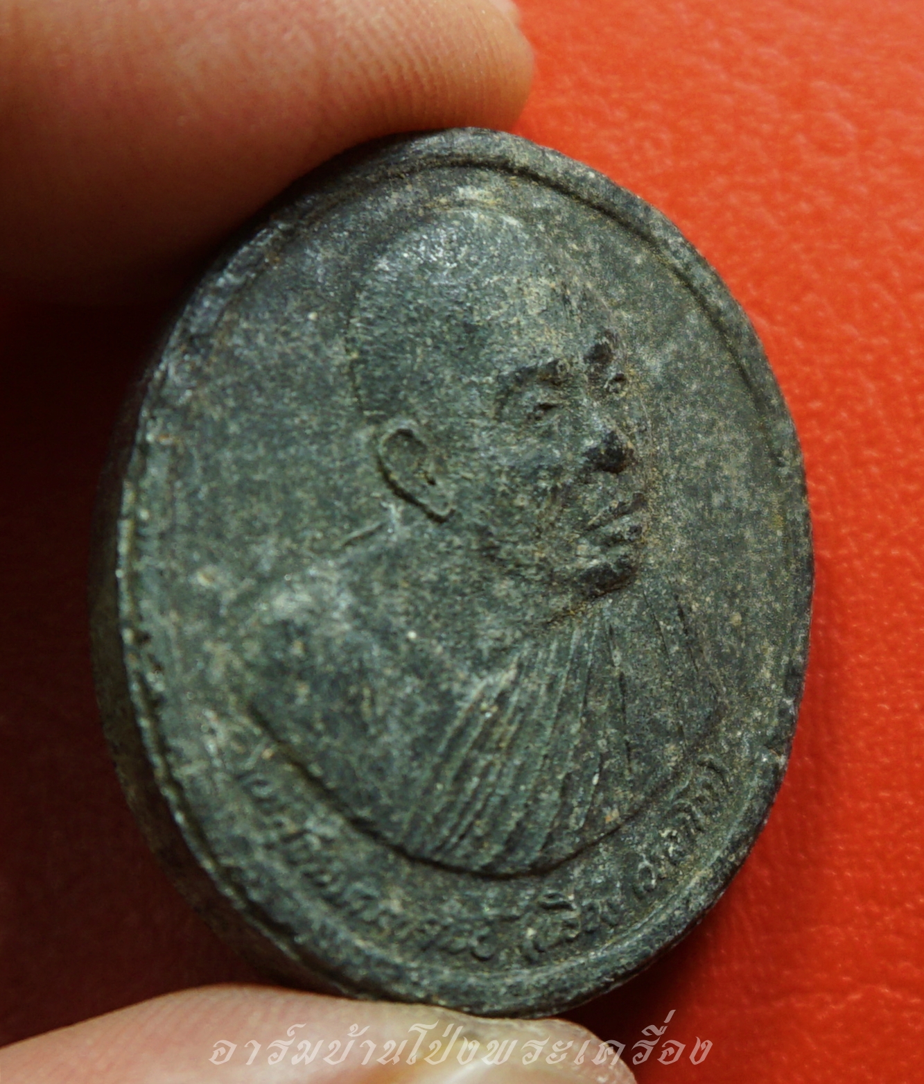 หลวงปู่เหรียญ วัดอรัญญบรรพต จ.หนองคาย รุ่นเจริญพร ที่ระลึกฉลองเจดีย์ ปี๒๕๔๑ เนื้อผงสีดำ(องค์ที่1)