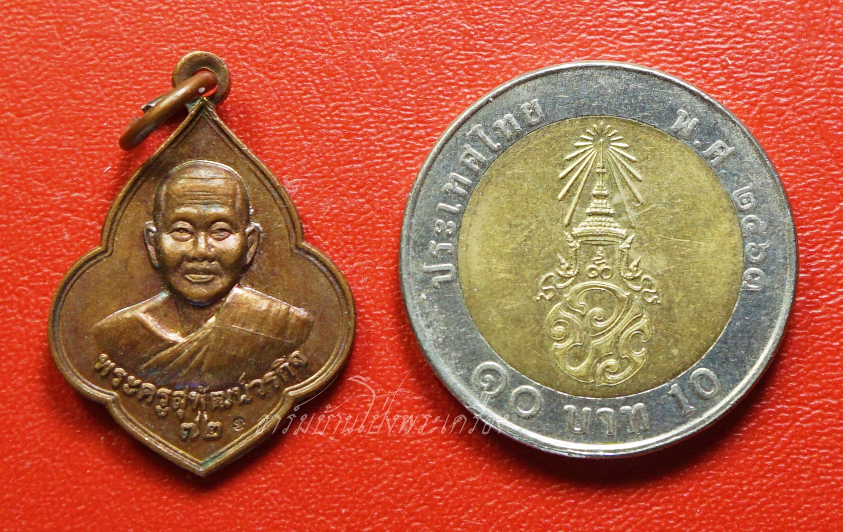 พระครูสุพัฒน์วรกิจ อาจารย์ออย วัดชมภูพล อายุ๗๒ปี ปี๒๕๕๗ เนื้อทองแดง(องค์ที่1)