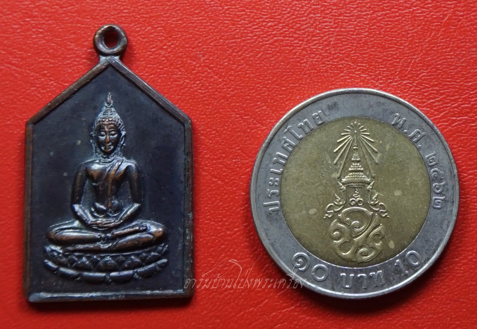 พระพุทธ วัดบ้านโป่ง หลังยันต์สามดวง เนื้อทองแดงรมดำ(องค์ที่2)