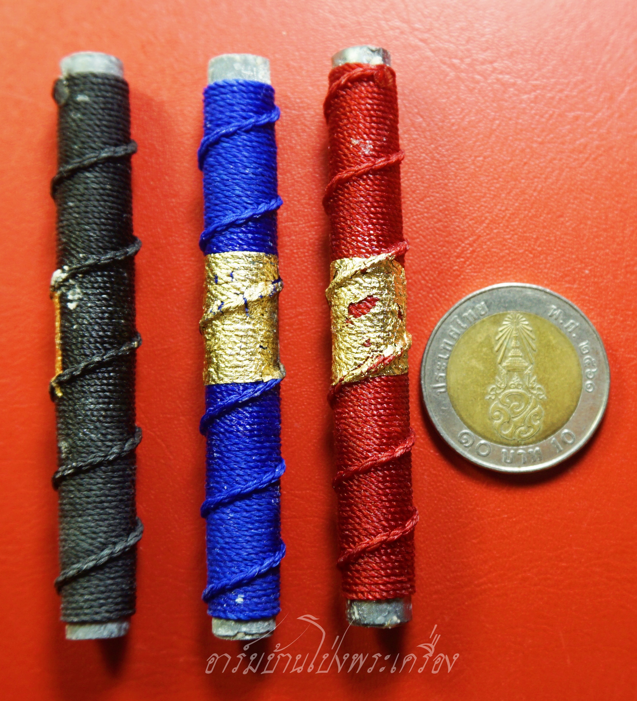 หลวงปู่แผ้ว ปวโร วัดกำแพงแสน ตะกรุดโทน ปี๒๕๕๐ ถักเชือกสีแดง, น้ำเงิน, ดำ ตอกโค๊ต"ผ" เมตตา มหานิยม แคล้วคลาด ปลอดภัย(ชุดที่1)