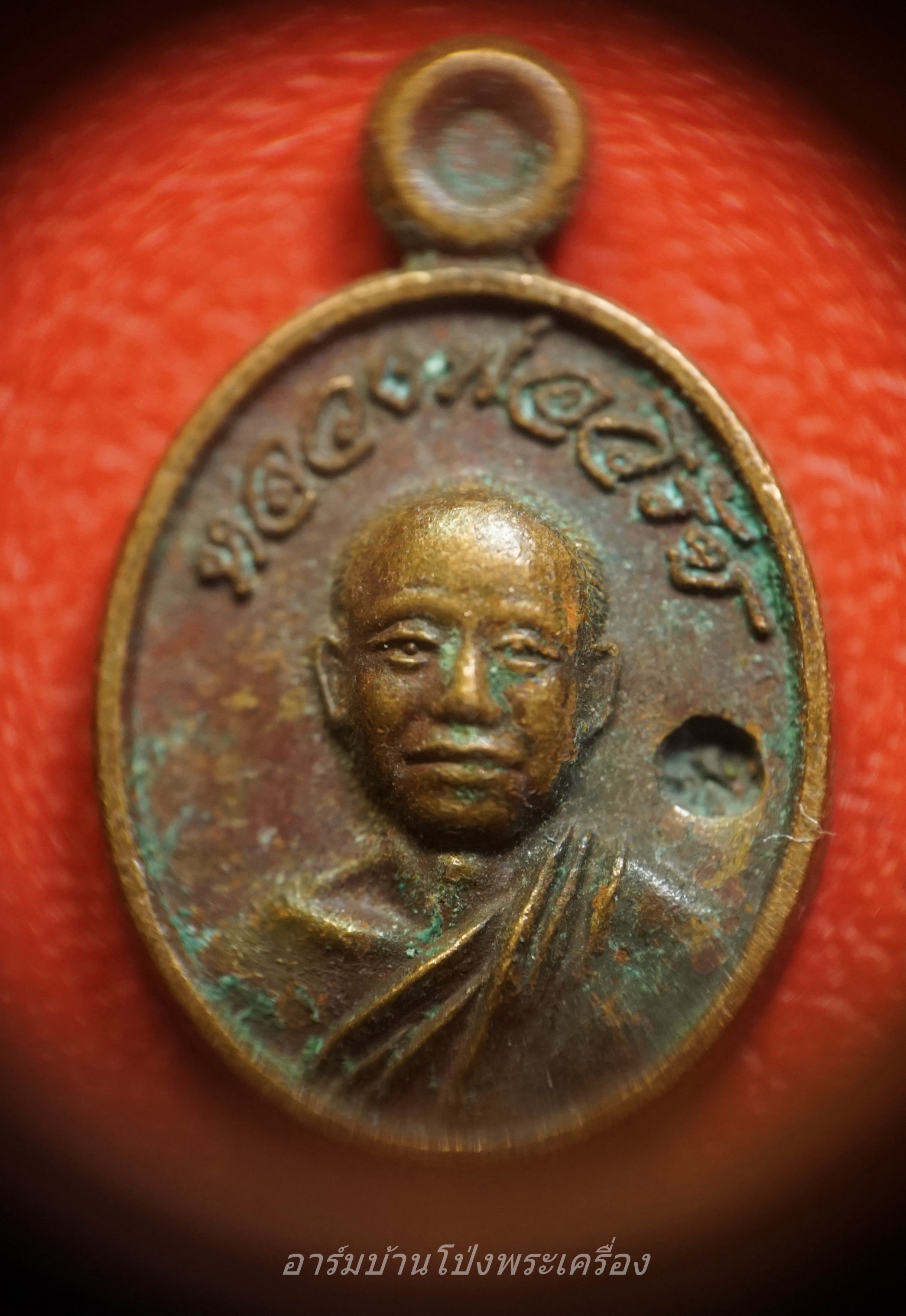 หลวงพ่อวิรัช วัดดีบอน เม็ดแตง เนื้อทองแดง ตอกโค๊ด(องค์ที่1)