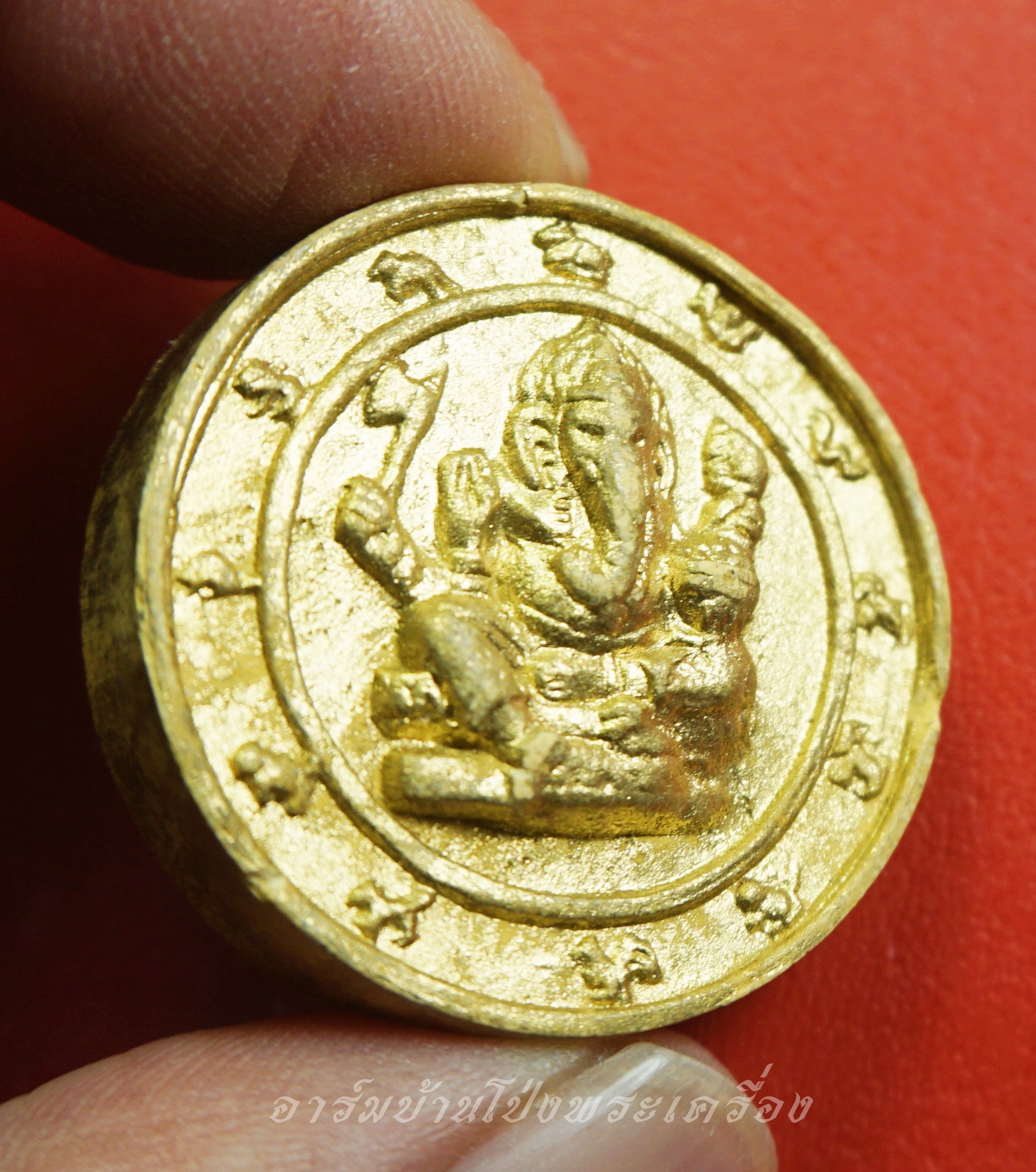 หลวงปู่แผ้ว วัดกำแพงแสน พระพิฆเนศ ด้านหน้าฝังตะกรุด เนื้อผงทาทอง(องค์ที่1)