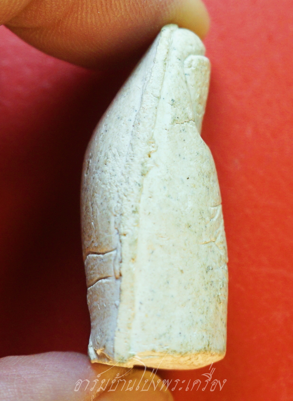 หลวงพ่อคูณ วัดบ้านไร่ นิ้วโป้งจำลอง ลงอักขระยันต์ ปี๒๕๓๖ เนื้อผง(องค์ที่9)