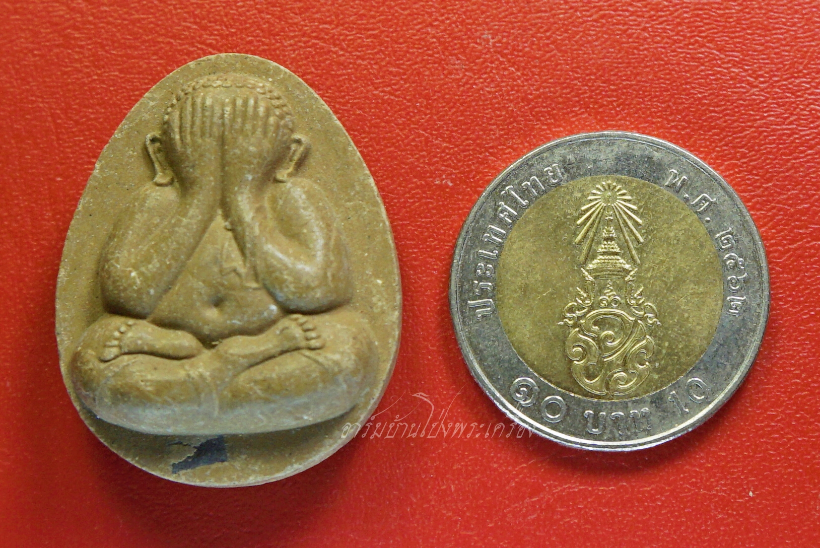 พระปิดตา หลวงพ่อรุ่ง วัดท่าไม้ เนื้อผง ฝังตะกรุดเงิน(องค์ที่1)