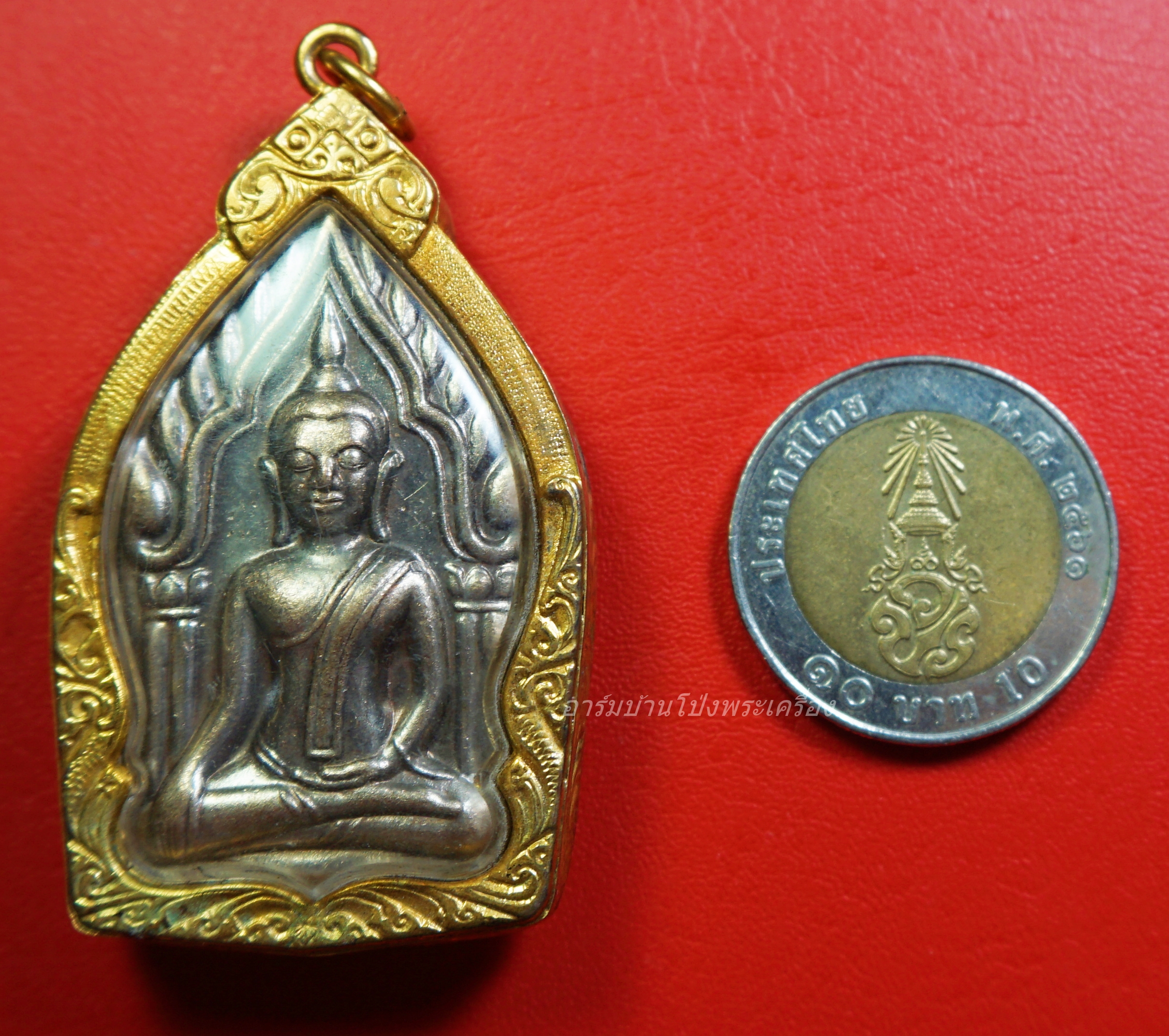 หลวงพ่อพูล วัดไผ่ล้อม กุมารสมบัติ เนื้อกะไหล่เงิน(องค์ที่1)