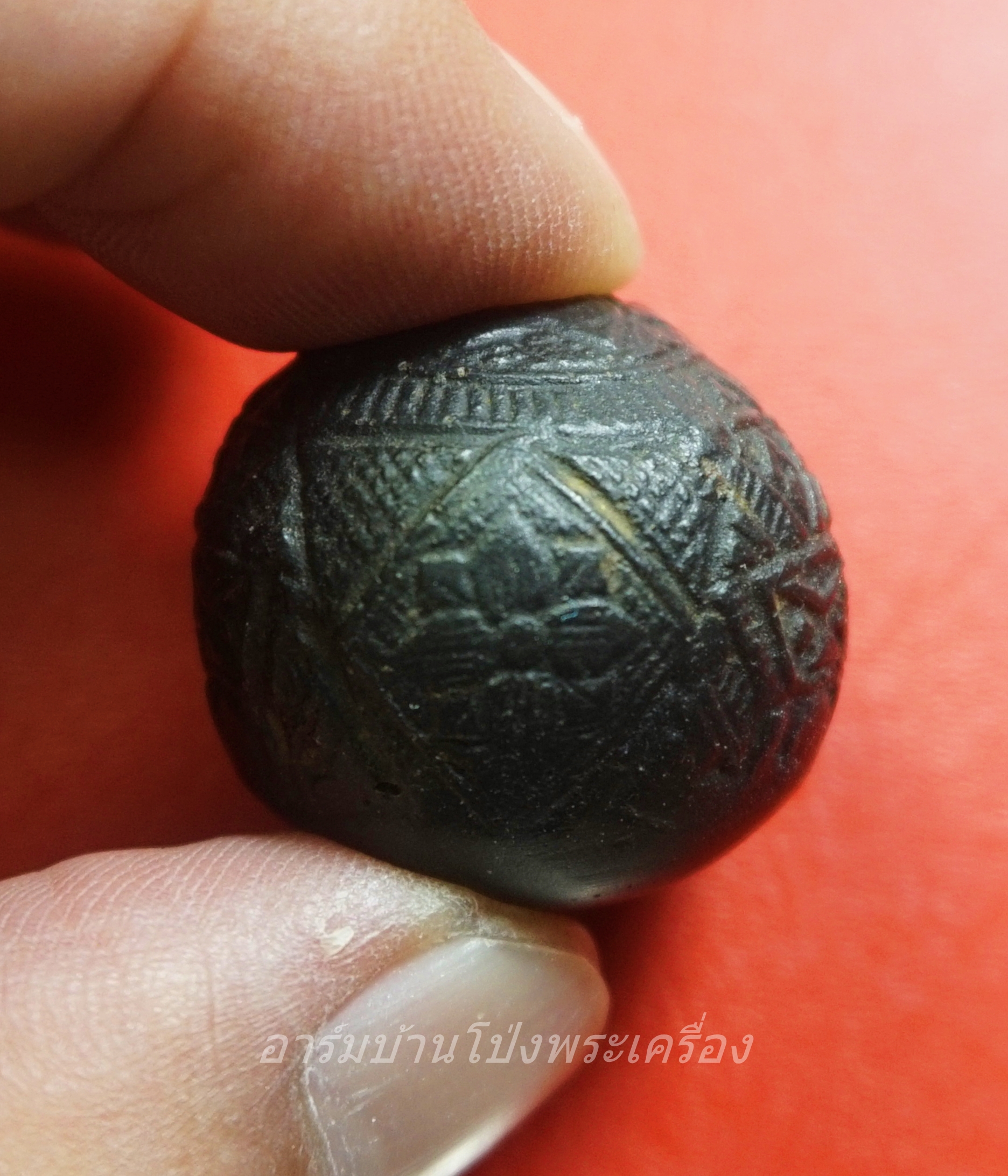 คตมะพร้าวสุดยอดของมงคลศักสิทธิ์ ป้องกันไสยศาสตร์ทุกชนิด เขย่ามีเสียงดัง แกะเป็นรูปราหู 3 หน้า(องค์ที่1)