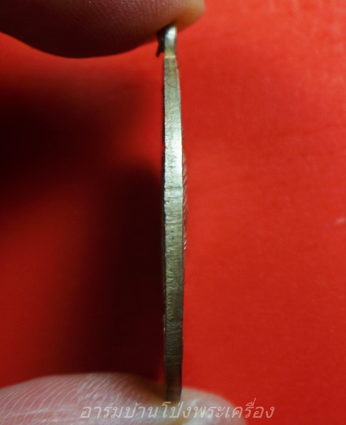 หลวงพ่อโก๊ะ วัดเก้าห้อง รุ่นปฏิสังขรอุโบสถ ปี๒๕๓๔ ขาไป เนื้อเงิน(องค์ที่1)