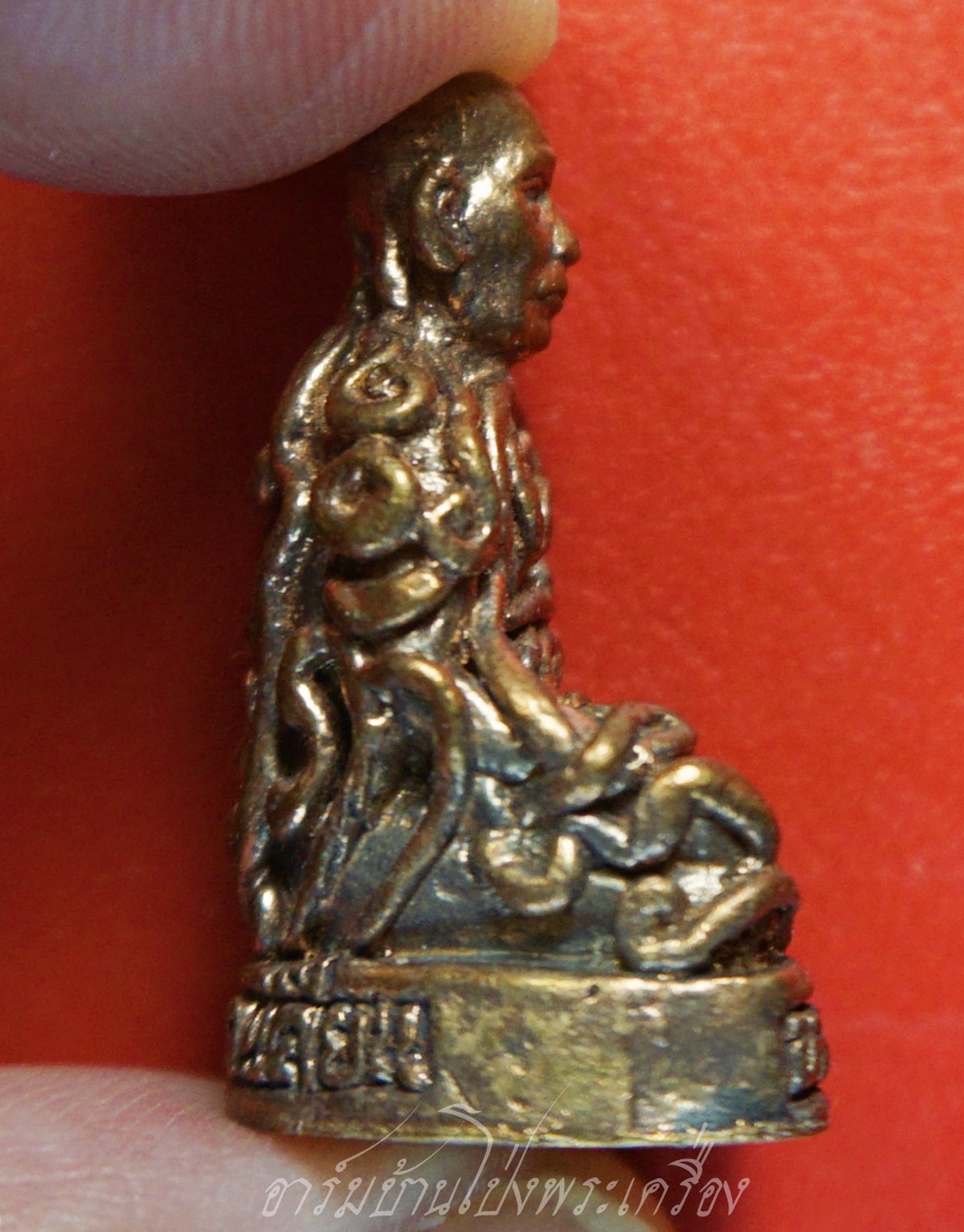 หลวงพ่อโปร่ง วัดถ้ำพรุตะเคียน จ.ชุมพร รูปหล่อยันต์ยุ่ง ก้นอุดผงพุทธคุณ ฝังตะกรุด เนื้อทองแดง เลข505 (องค์ที่1)