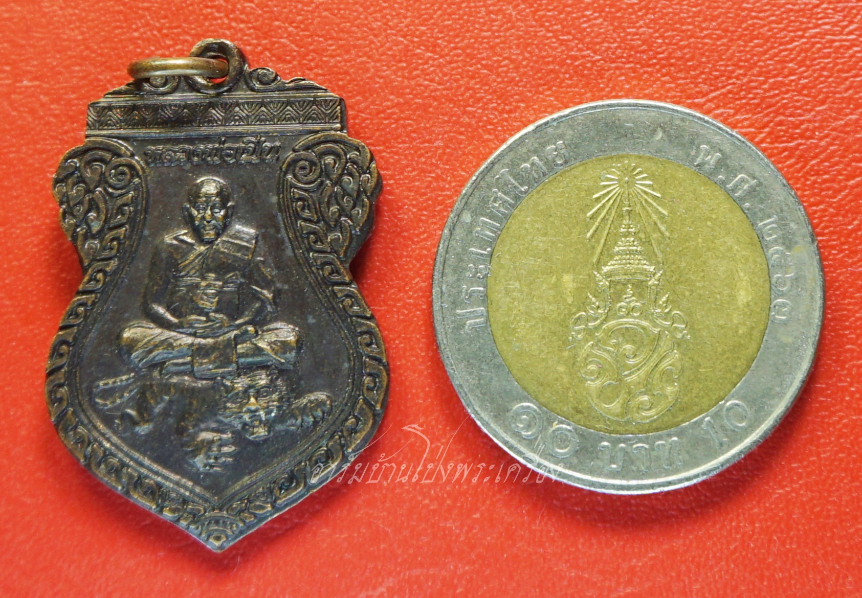 หลวงพ่อเปิ่น วัดบางพระ เหรียญเสมานั่งเสือ เมตตามหาบารมี หลังบรมครูฤาษี ปี๒๕๕๓ หลังตอกโค๊ต เนื้อทองแดงรมดำ(องค์ที่1)