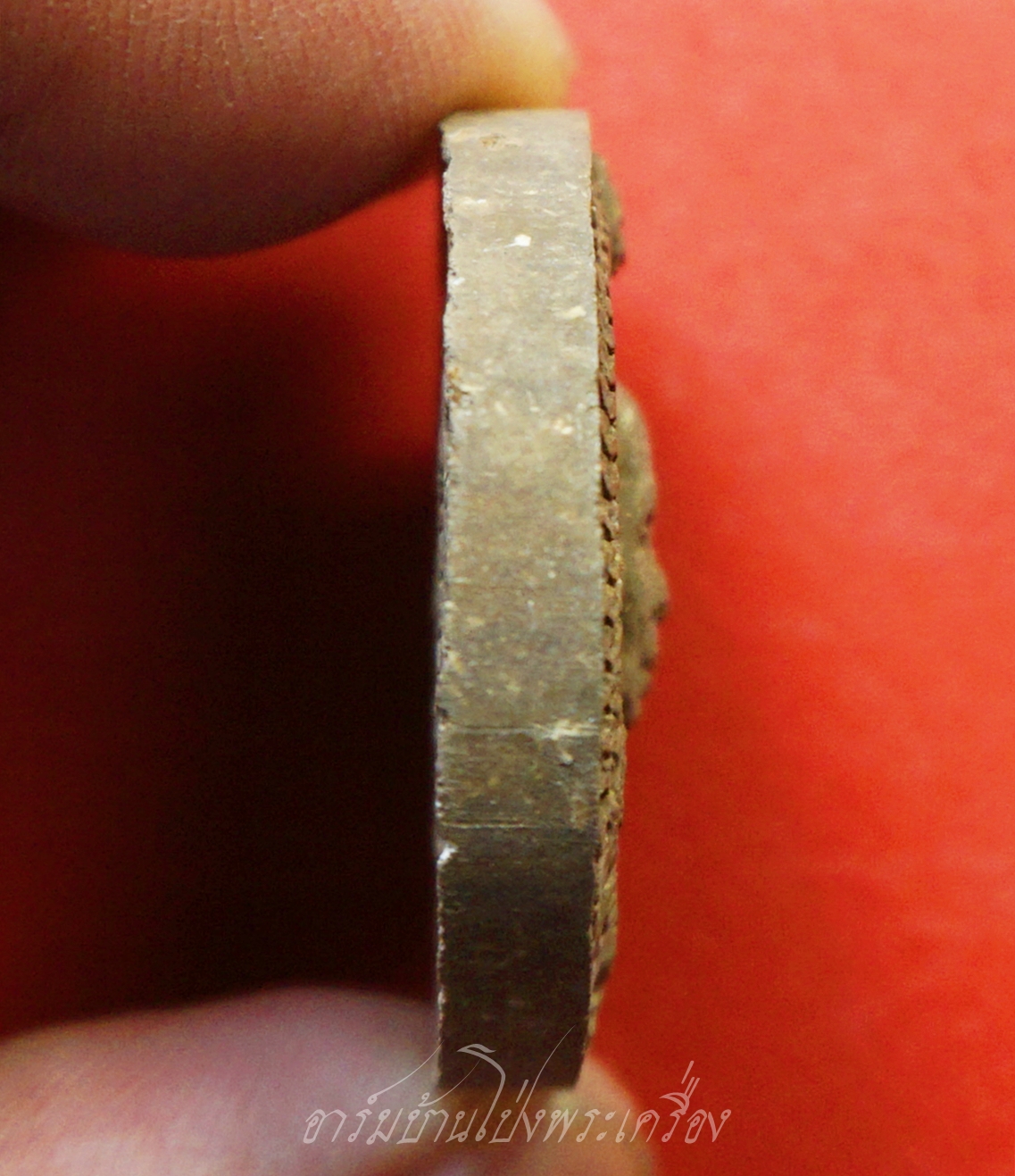 หลวงปู่แผ้ว วัดกำแพงแสน พระผงสีน้ำตาล หลังยันต์(องค์ที่2)