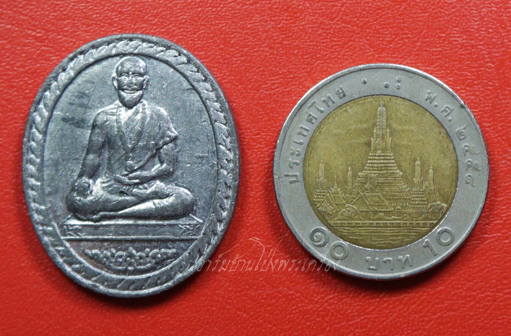 เหรียญหมอชีวกโกมารภัจจ์ ความไม่มีโรคเป็นลาภอันประเสริฐ เนื้อตะกั่ว ตอกโค๊ตและหมายเลข๓๑๓(องค์ที่2)