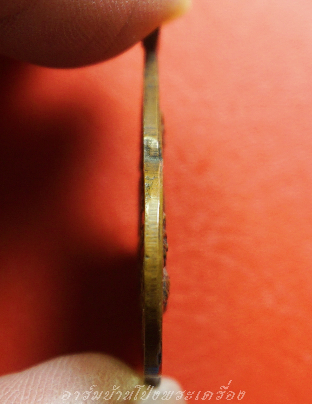 หลวงปู่ชอบ วัดเขารังเสือ รุ่นฉลองอายุ๗รอบ จับหัวเสือ เนื้อทองแดง(องค์ที่2)