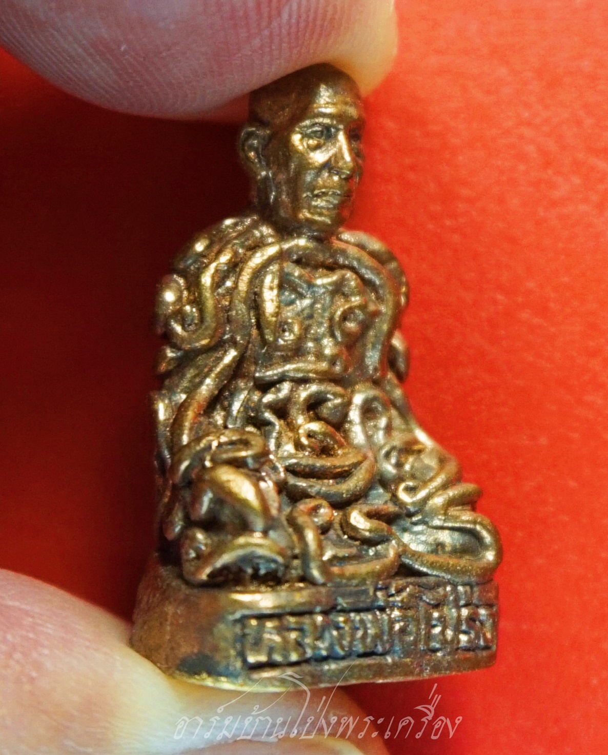 หลวงพ่อโปร่ง วัดถ้ำพรุตะเคียน จ.ชุมพร รูปหล่อยันต์ยุ่ง ก้นอุดผงพุทธคุณ ฝังตะกรุด เนื้อทองแดง เลข505 (องค์ที่1)