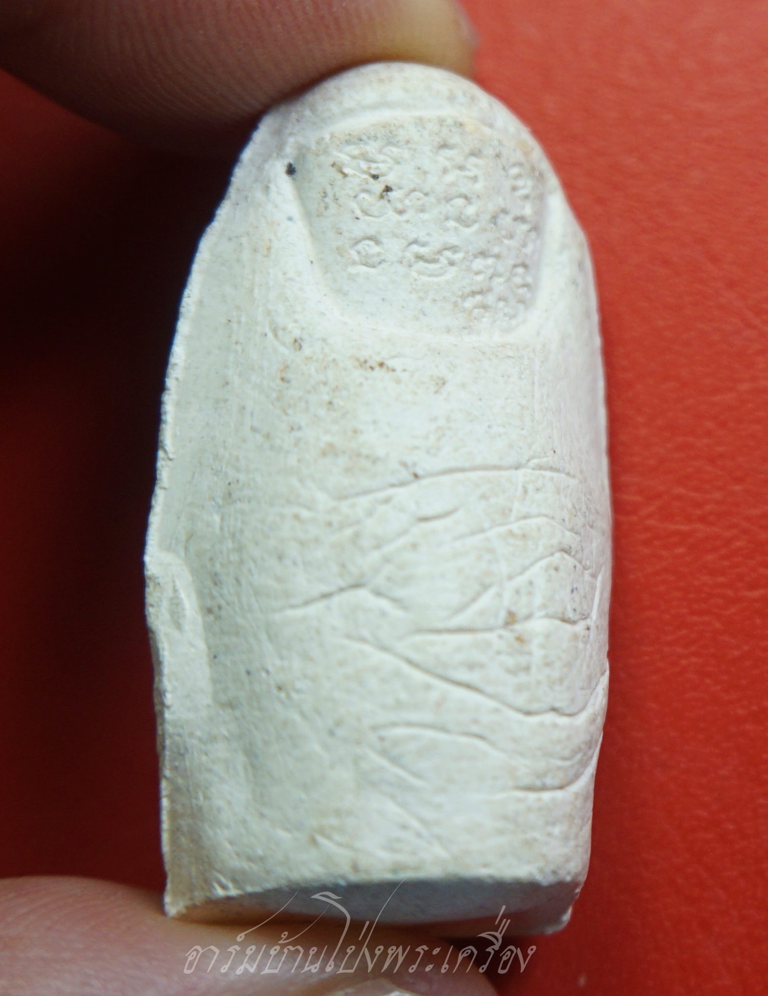 หลวงพ่อคูณ วัดบ้านไร่ นิ้วโป้งจำลอง ลงอักขระยันต์ ปี๒๕๓๖ เนื้อผง(องค์ที่12)