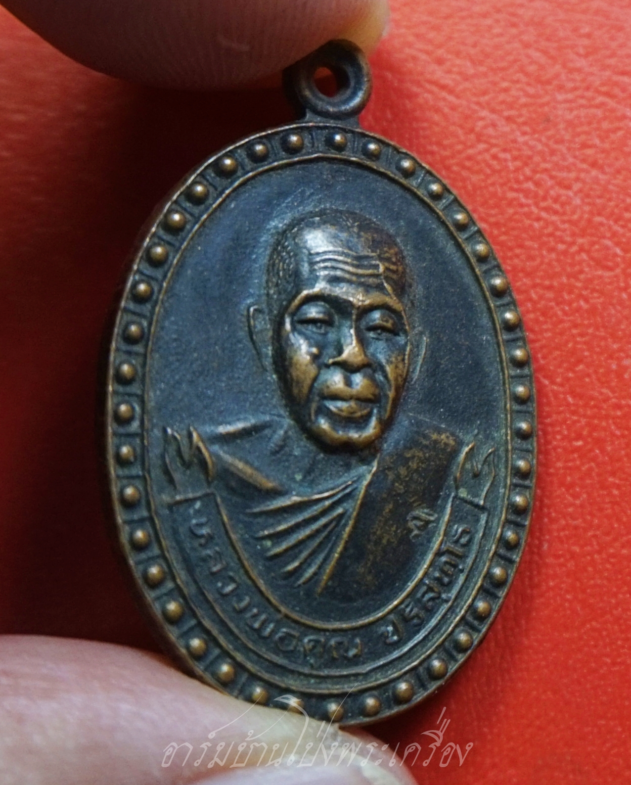 หลวงพ่อคูณ รุ่นสร้างพระวิษณุกรรม วิทยาลัยเทคนิคชัยภูมิ ปี๒๕๓๖ เนื้อทองแดงรมดำ ตอกโค๊ต(องค์ที่1)