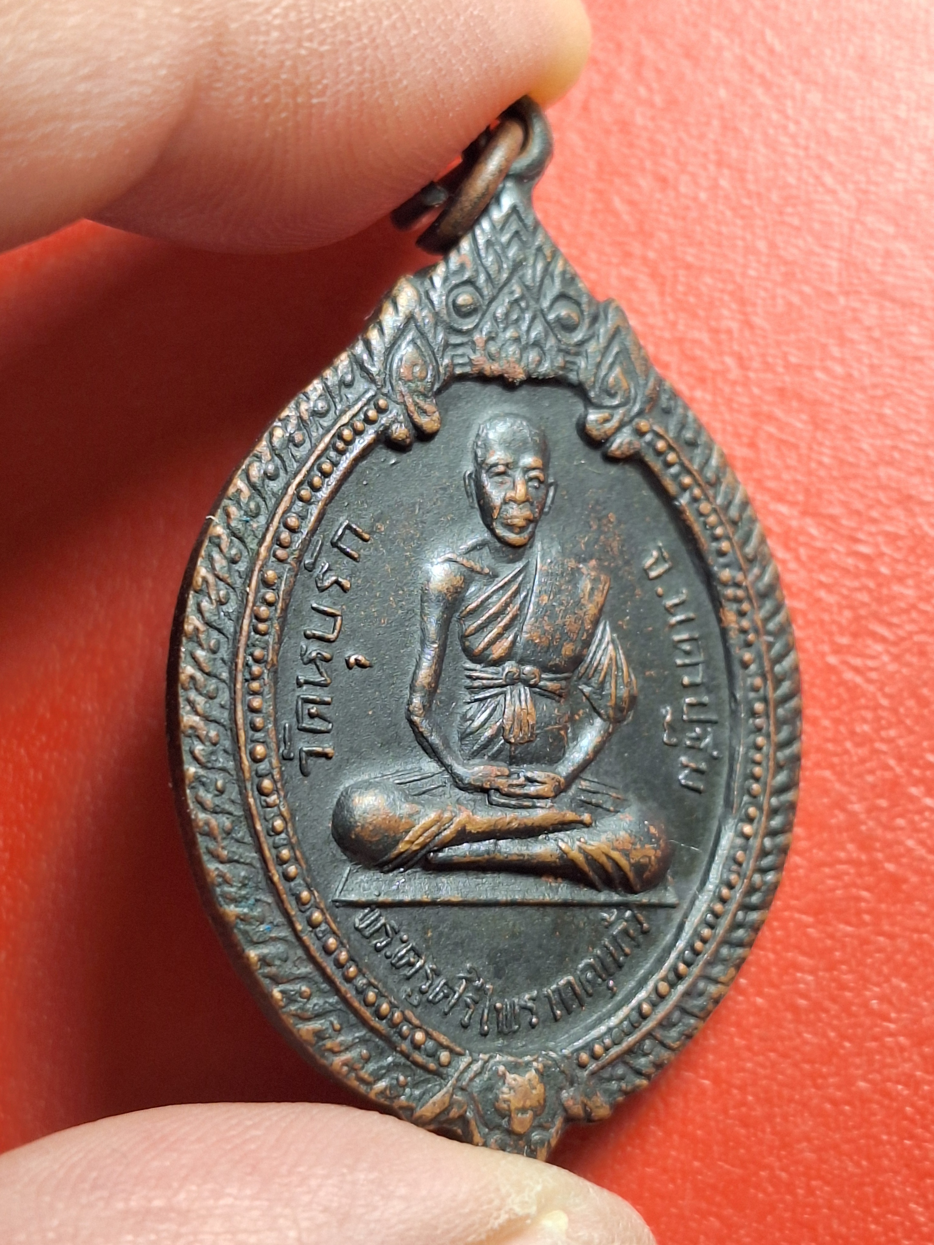 หลวงพ่อศรีไพร วัดหุบรัก หลังหนุมาน เนื้อทองแดงรมดำ(องค์ที่4)