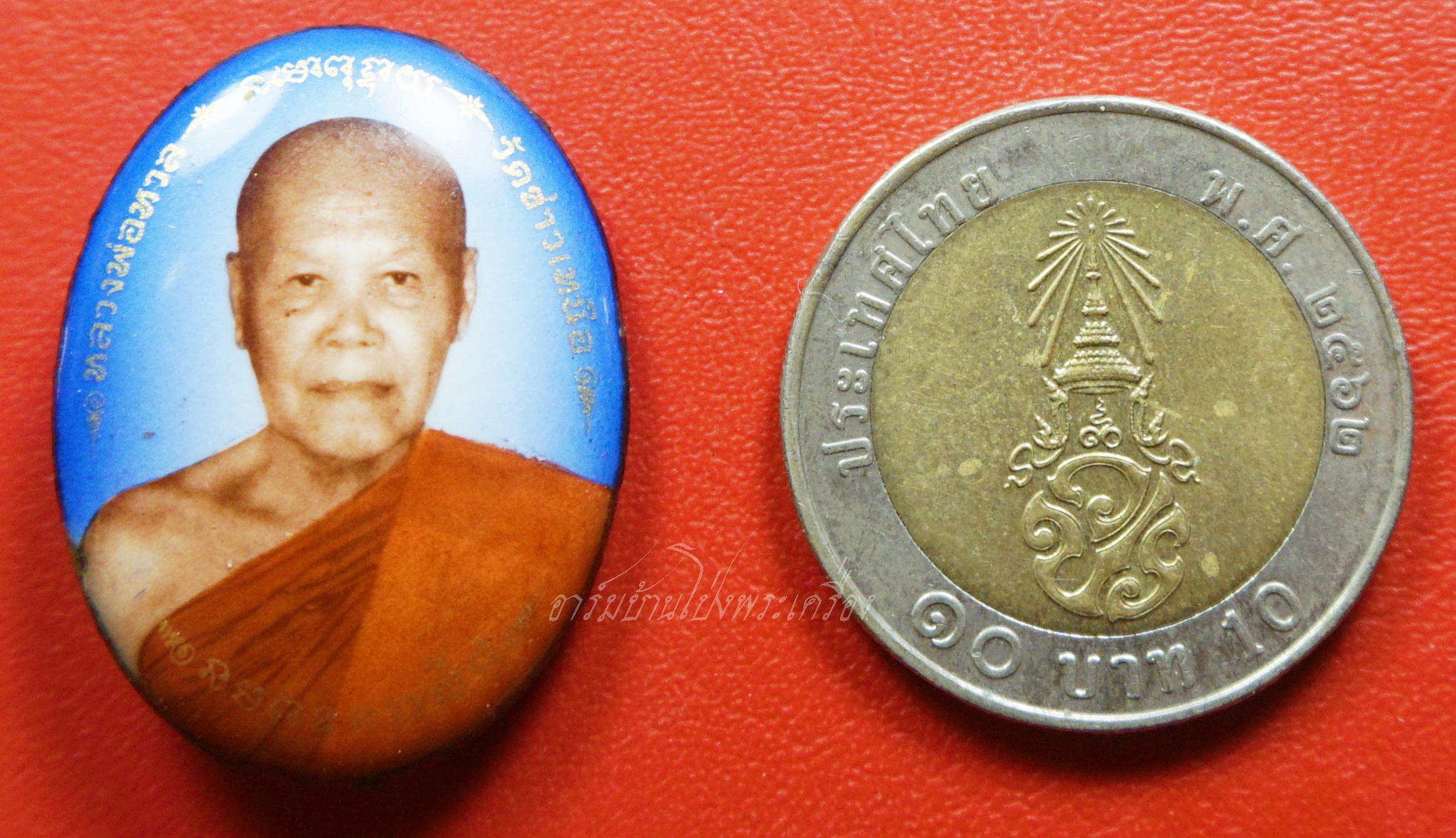 หลวงพ่อหวล วัดชาวเหนือ ล็อกเก็ตหลังนาคปรก รุ่นรัตนชาติ ปี๒๕๕๘(องค์ที่1)