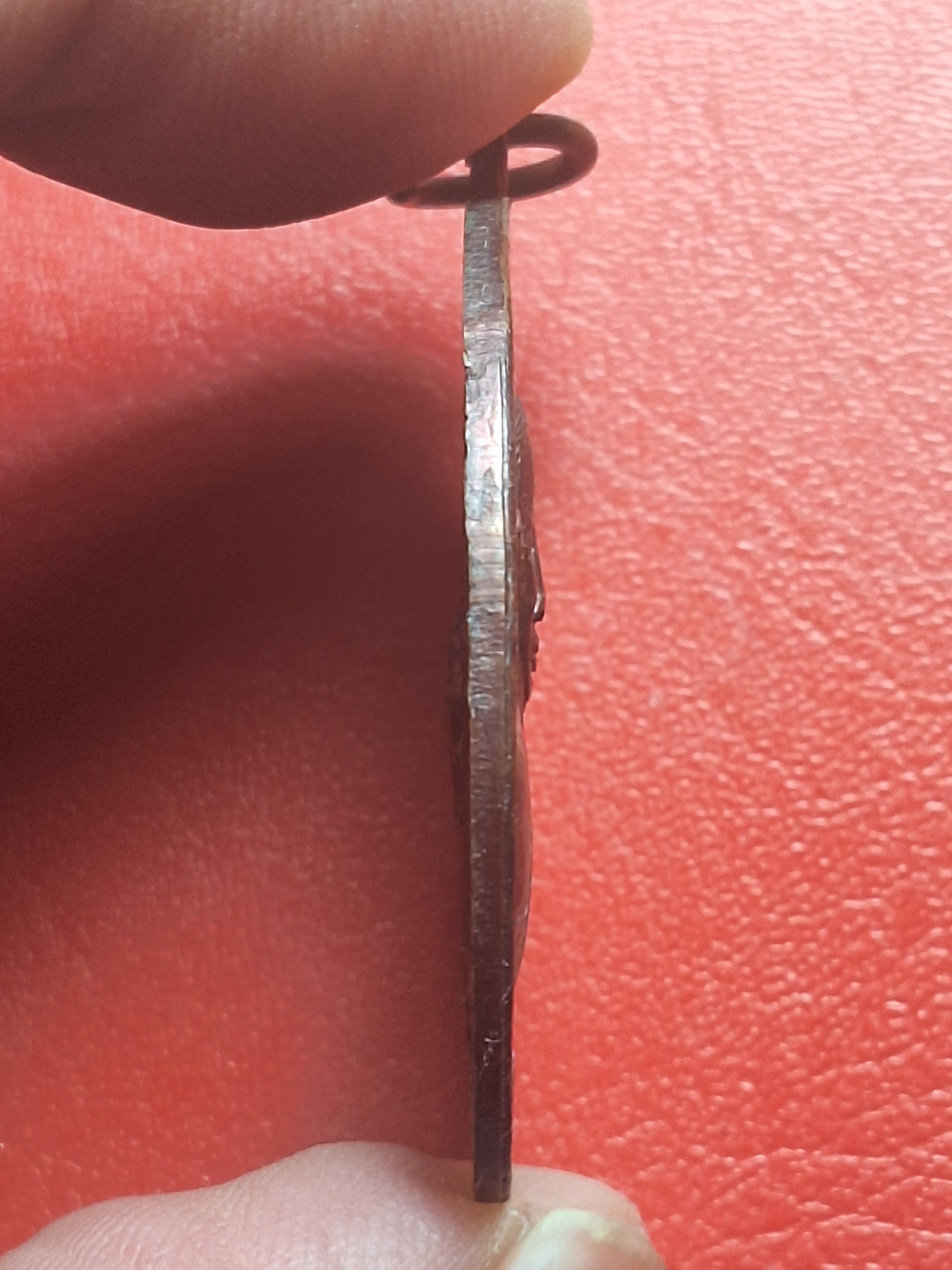 หลวงพ่อคิ้ม วัดหนองเสือ รุ่นแรก หลังสิงห์ เนื้อทองแดงรมดำ(องค์ที่13)