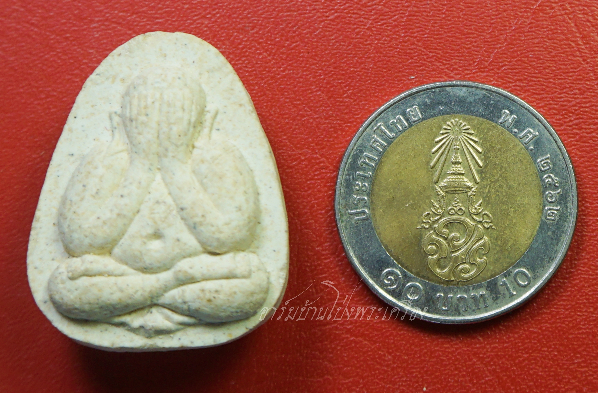 พระปิดตา หลวงพ่อหยอด วัดแก้วเจริญ จ.สมุทรสงคราม เนื้อผงสีขาว(องค์ที่1)