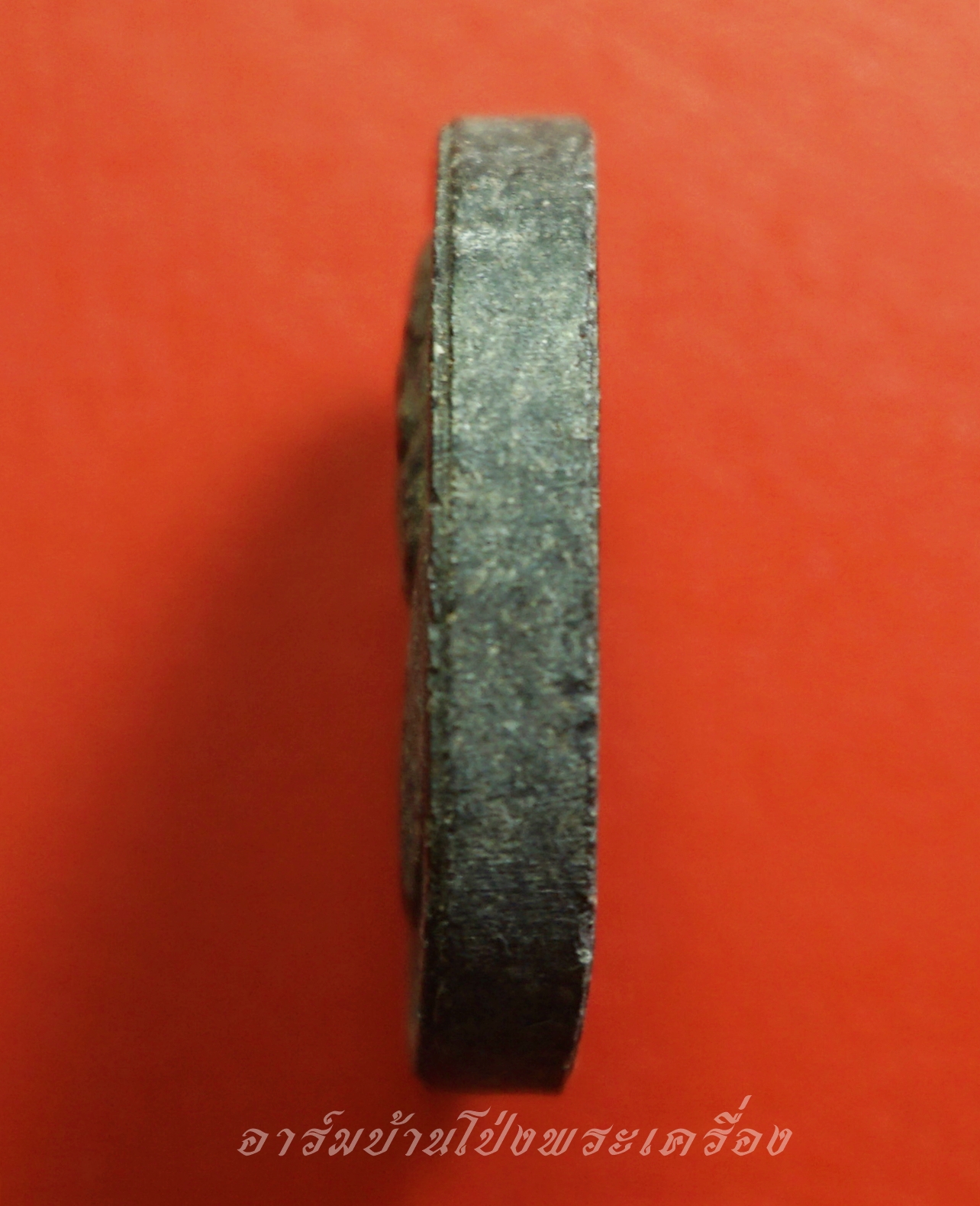 หลวงปู่เหรียญ วัดอรัญญบรรพต จ.หนองคาย รุ่นเจริญพร ที่ระลึกฉลองเจดีย์ ปี๒๕๔๑ เนื้อผงสีดำ(องค์ที่1)