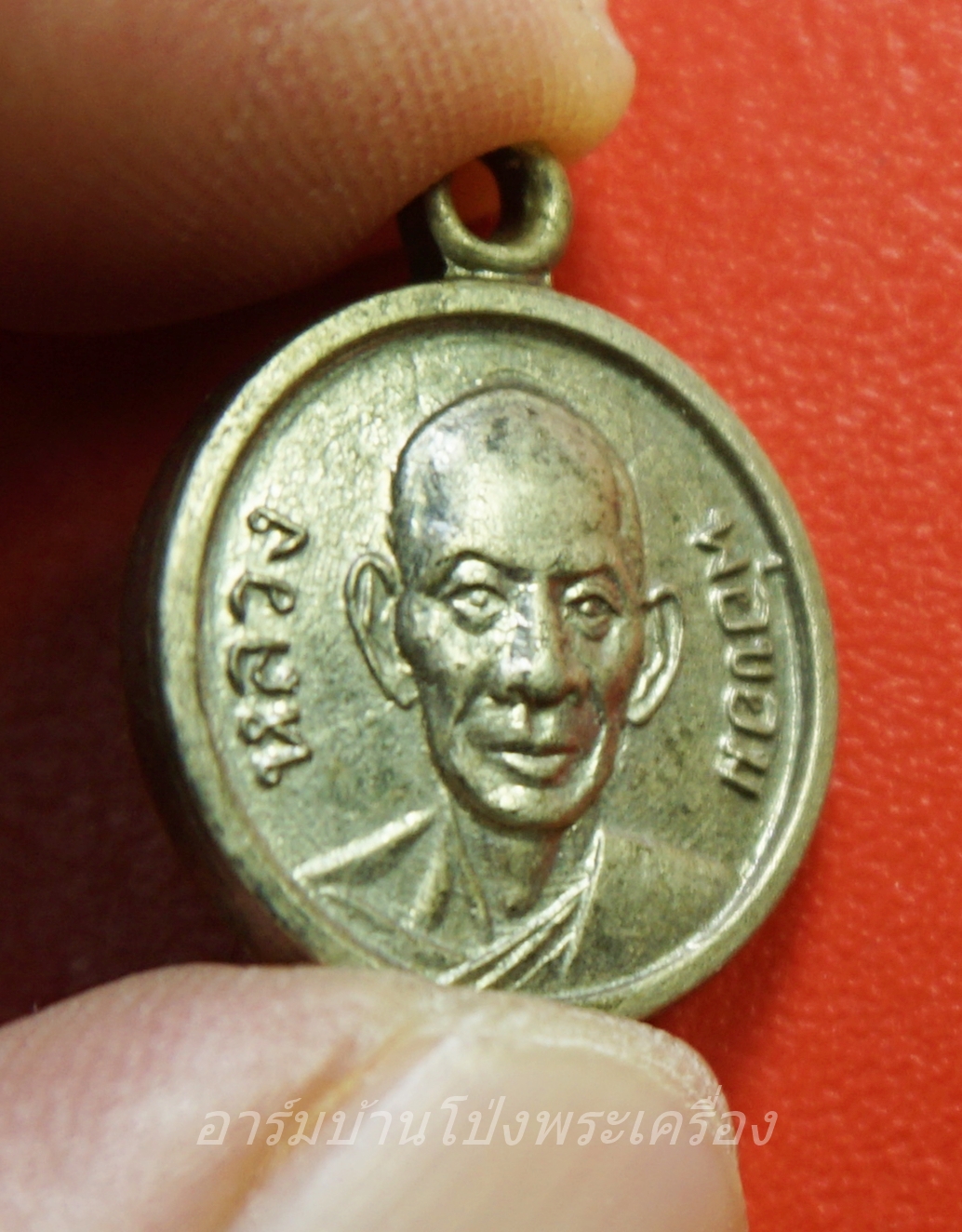 หลวงพ่อขอม วัดไผ่โรงวัว หลังพระประจำวันพฤหัสบดี เนื้อกะไหล่เงิน(องค์ที่1)