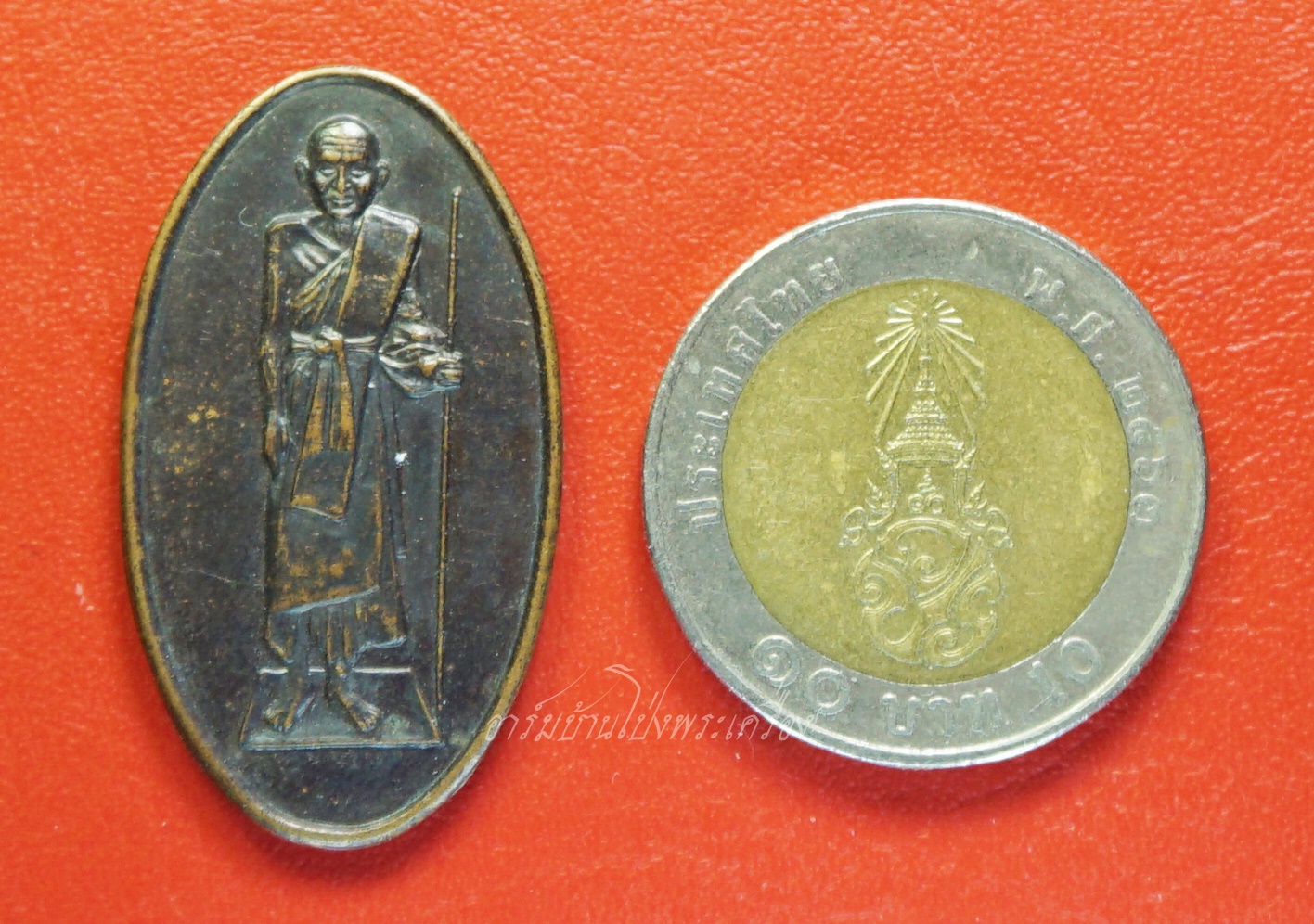 หลวงปู่ศุข วัดปากคลองมะขามเฒ่า ปี๒๕๓๗ ตอกโค๊ตยันต์"นะ" เนื้อทองแดงรมดำ(องค์ที่1)