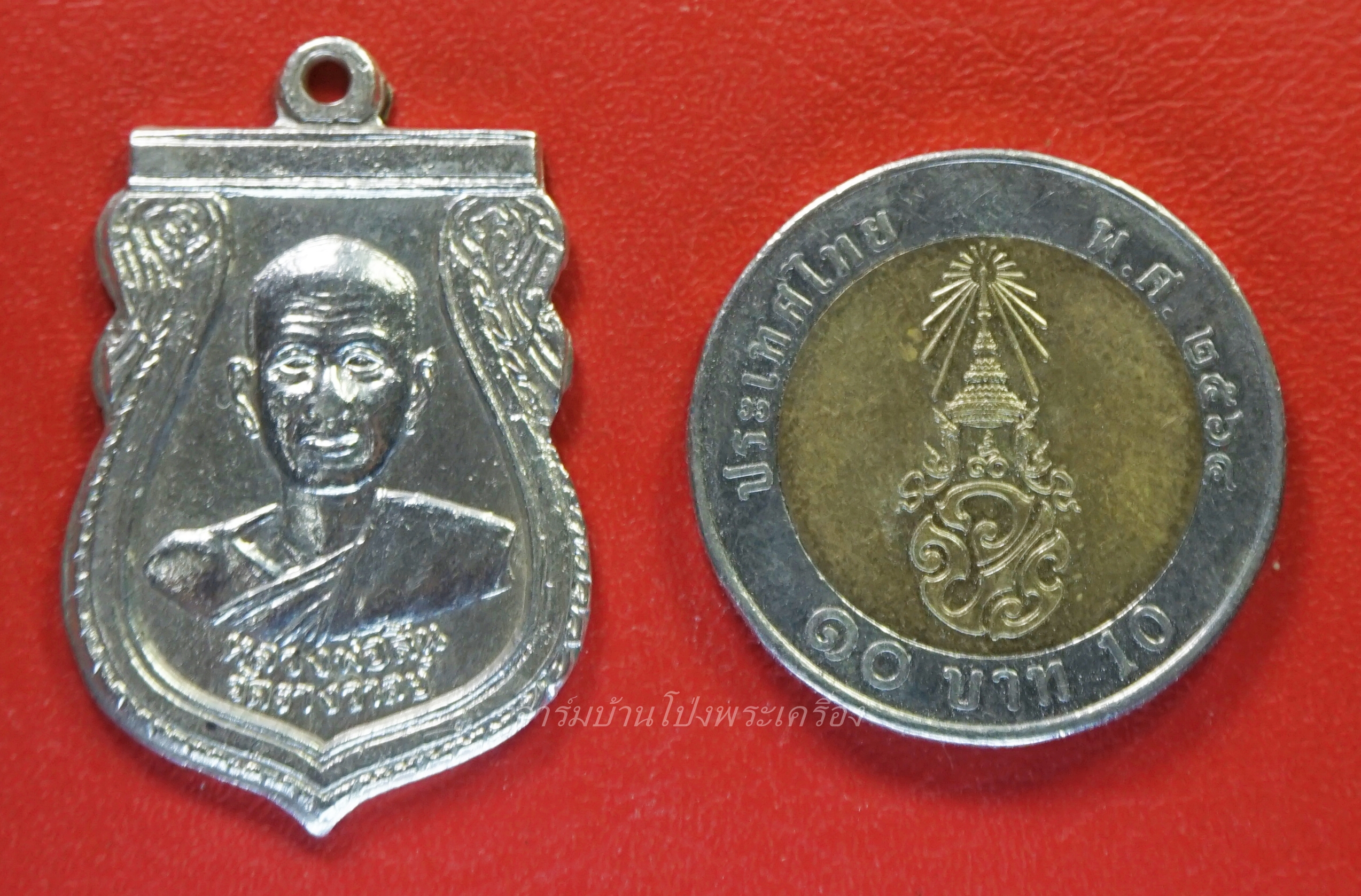 หลวงพ่อสิน วัดรางวาลย์ เนื้ออัลปาก้า หลังยันต์หมูไฟ(องค์ที่2)