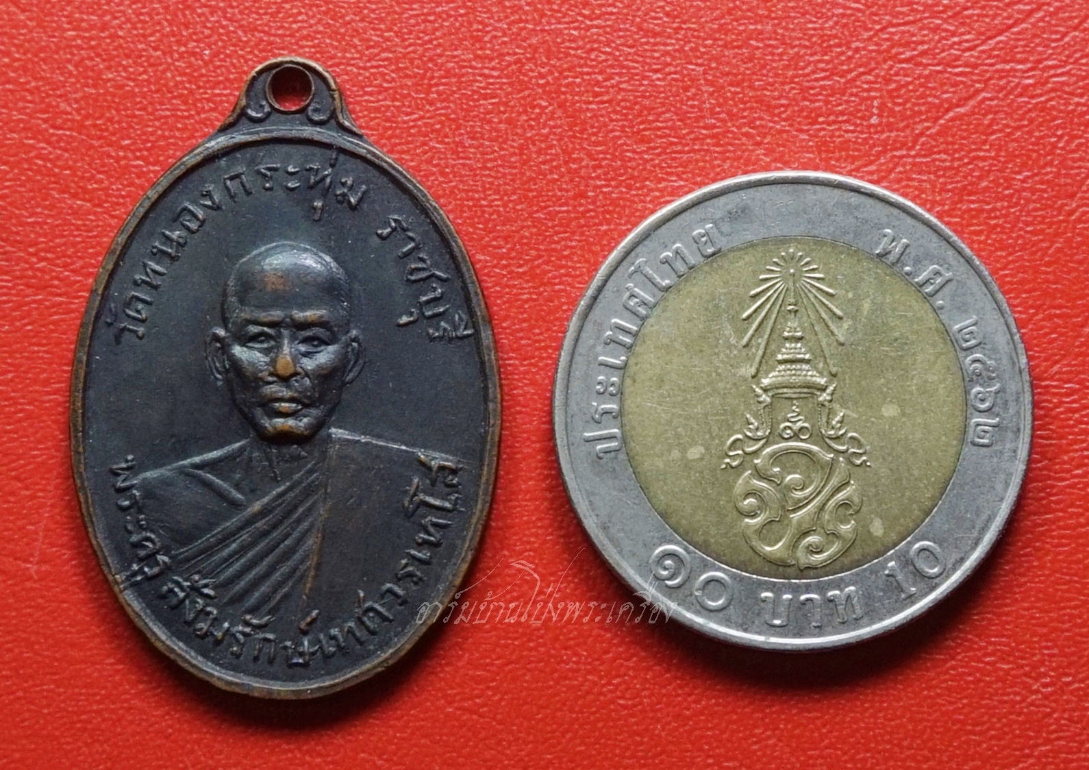 พระครูสังฆรักษ์เทศ วรเทโส(หลวงพ่อเทศ) วัดหนองกระทุ่ม รุ่นแรก ปี๒๕๑๓ พิมพ์หน้าแก่ เนื้อทองแดงรมดำ(องค์ที่5)