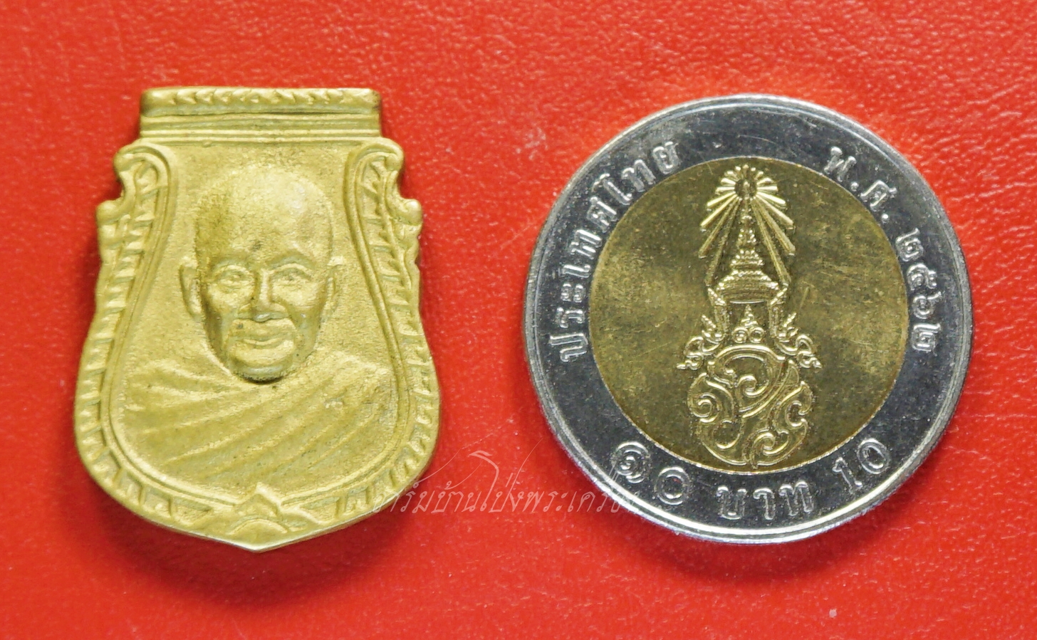 หลวงพ่อเปิ่น ฐิตคุโณ วัดบางพระ จ.นครปฐม พ.ศ.๒๕๓๖ เหรียญหล่อ พิมพ์หน้าเสือ รุ่น๑ เนื้อทองผสม ตอกโค๊ต(องค์ที่1)
