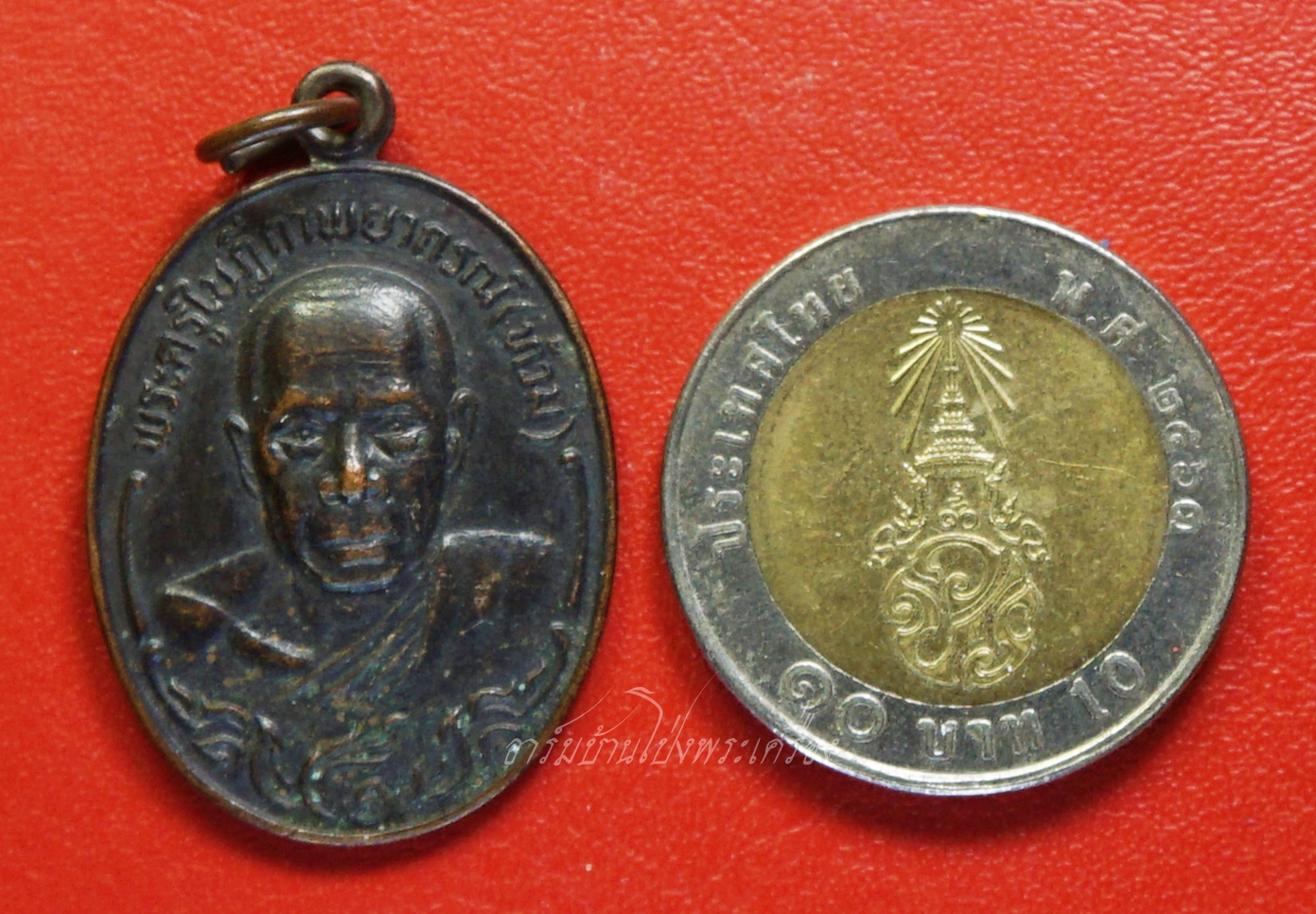 พระครูใบฎีกาพยากรณ์(ท้วม) วัดแสนสุข จ.ชลบุรี รุ่นปักกรดไม่ถอน เนื้อทองแดงรมดำ(องค์ที่1)