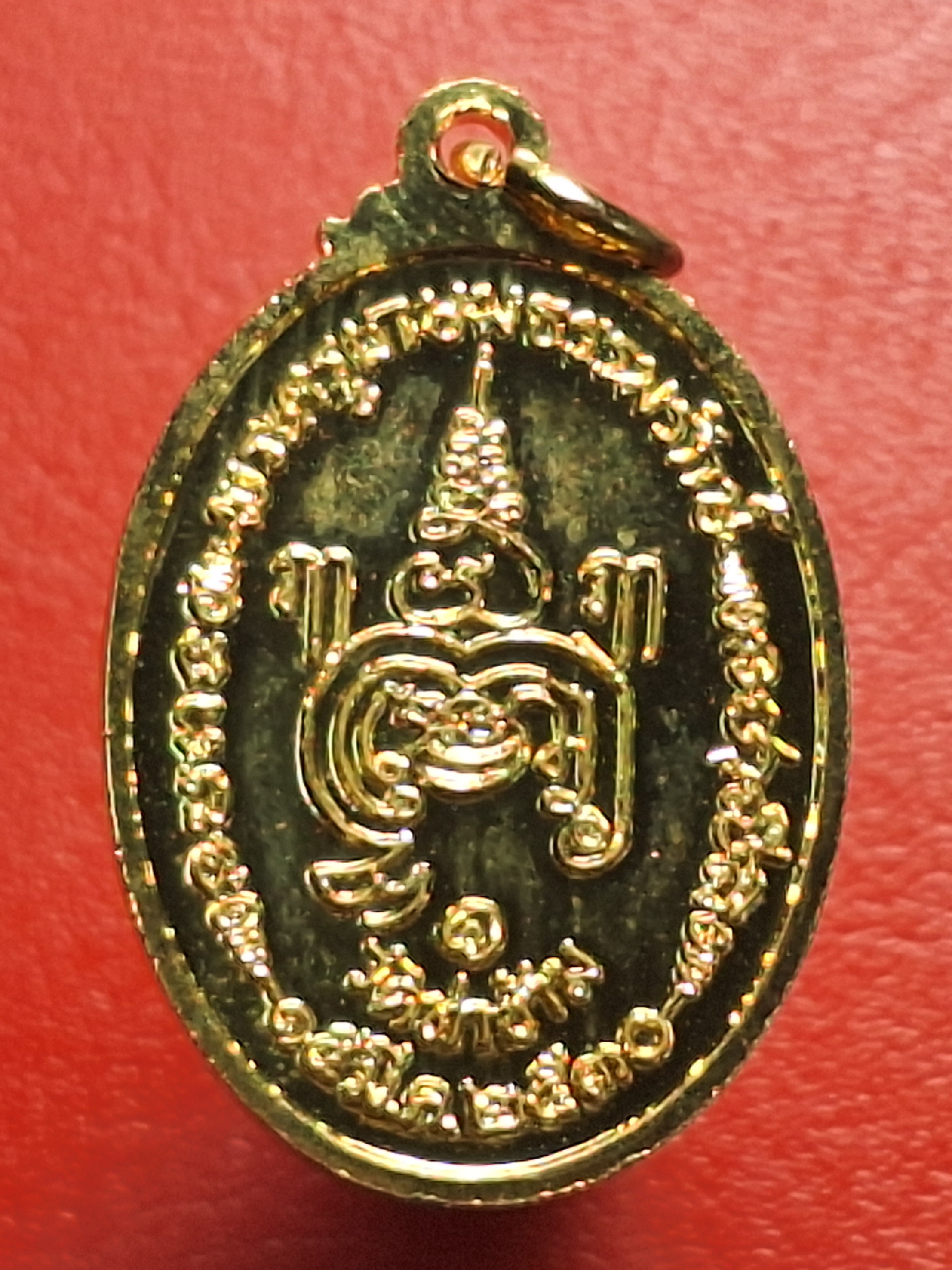 หลวงพ่อยะ วัดท่าข้าม รุ่นแรก ปี๒๕๓๐ เหรียญรูปไข่ พิมพ์เล็ก เนื้อกะไหล่ทอง(องค์ที่5)