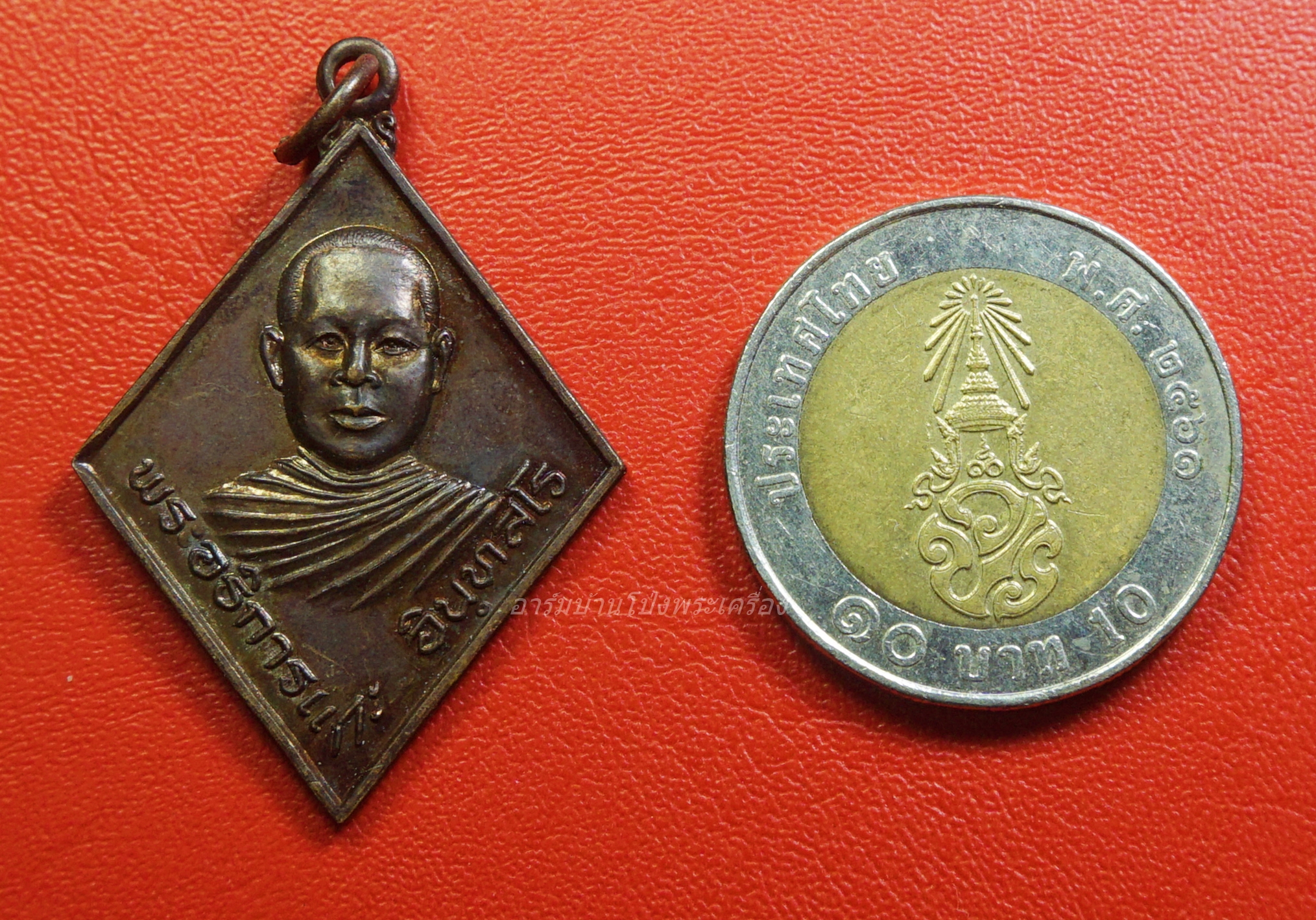 พระอธิการแกะ วัดเลาเต่า เนื้อทองแดง(องค์ที่2)