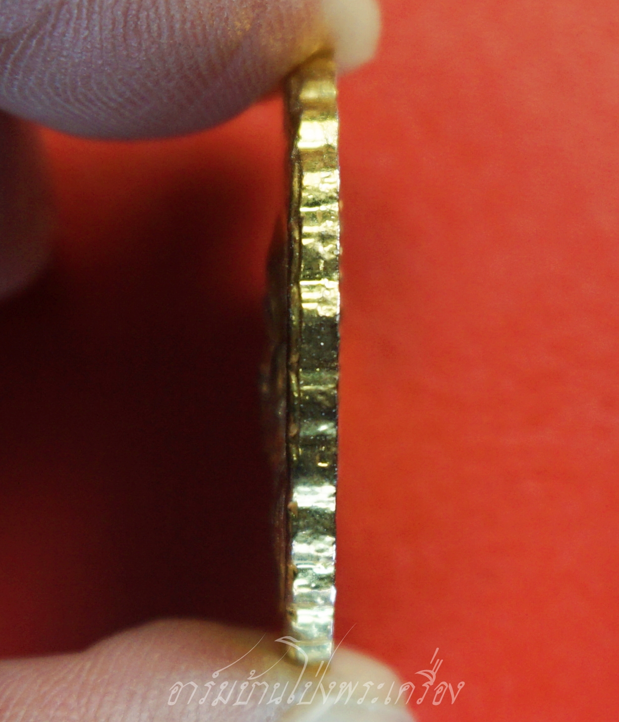 หลวงพ่อคูณ หลัง สก. สมทบทุนมูลนิธิส่งเสริมศิลปาชีพ ปี๒๕๓๖ กะไหล่ทองลงยาสีแดง(องค์ที่1)