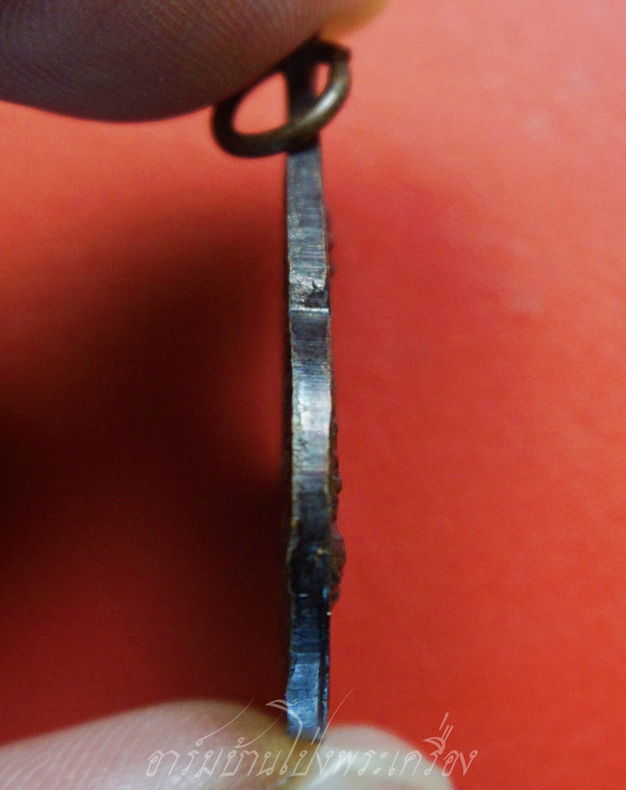 หลวงปู่ชอบ วัดเขารังเสือ รุ่นฉลองอายุ๗รอบ จับหัวเสือ เนื้อทองแดง(องค์ที่6)