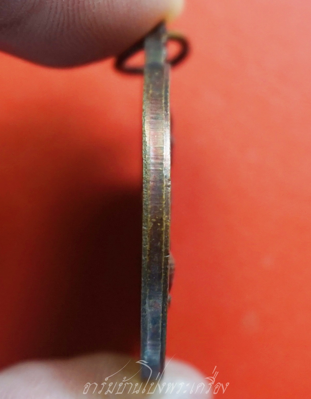 เหรียญหลวงพ่ออี๋ ที่หน่วยสงครามพิเศษทางเรือ สร้างปี๒๕๔๓ พิธีพุทธาภิเษก ณ วัดสัตหีบ จ.ชลบุรี เนื้อทองรมดำ(องค์ที่1)