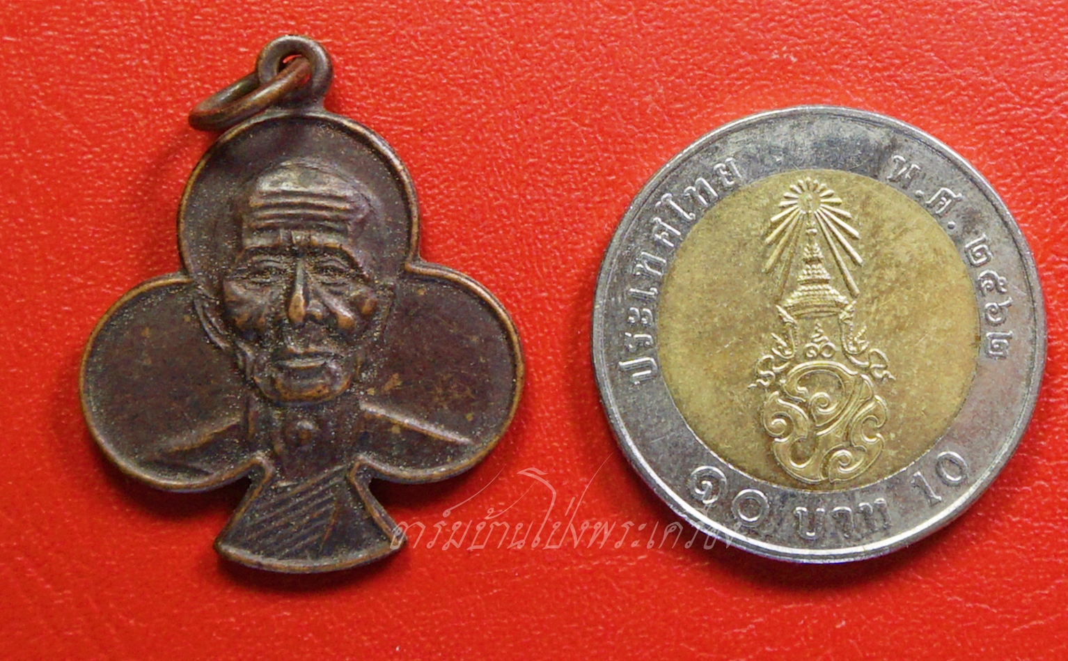 หลวงพ่อเก๋ วัดปากน้ำ เหรียญดอกจิก ฉลองศาลาการเปรียญ ปี๒๕๒๕ เนื้อทองแดงรมดำ(องค์ที่1)