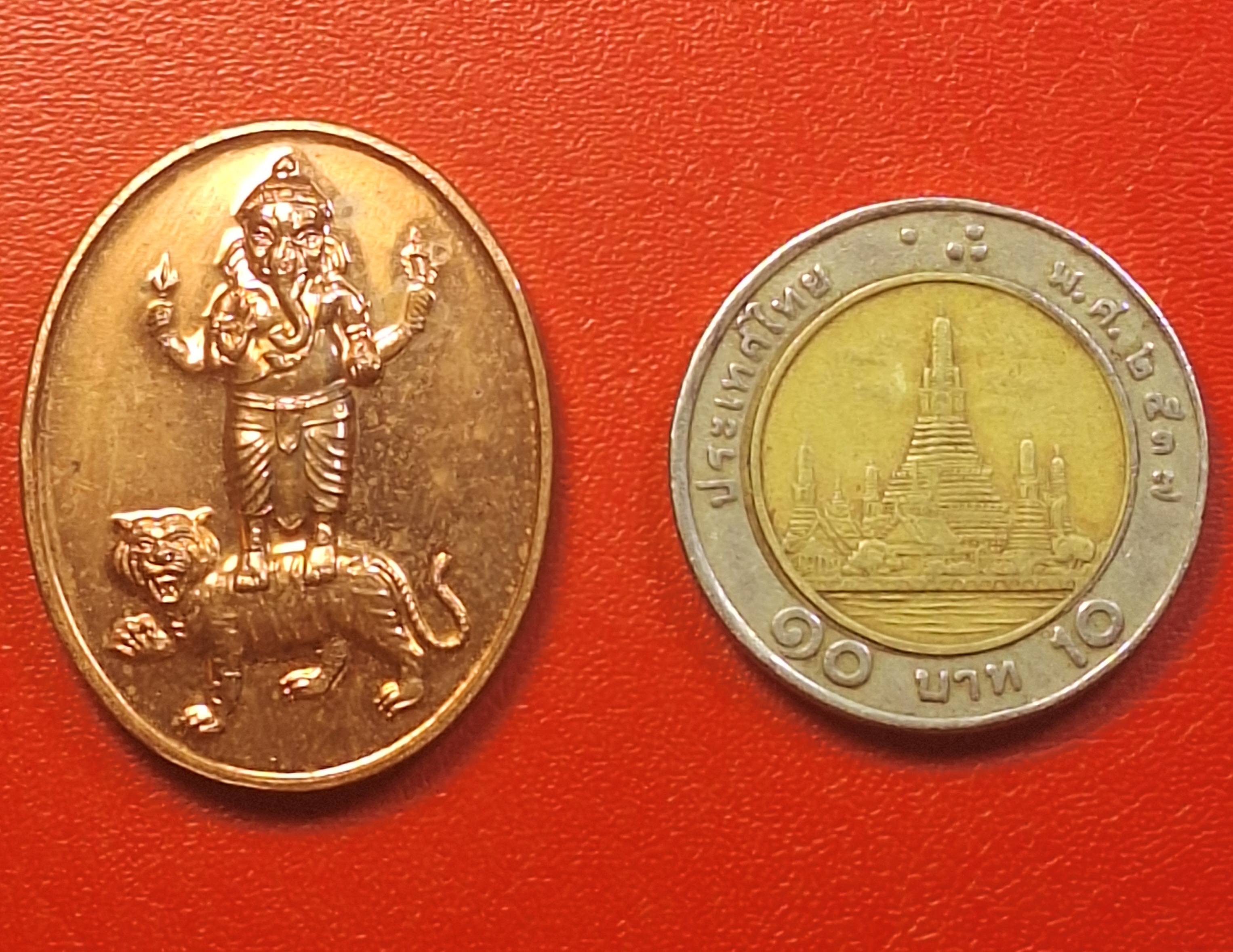 พระพิฆเนศทรงเสือ วัดนาคปรก(ธนบุรี) ปี๒๕๕๓ เนื้อทองแดง(องค์ที่1)